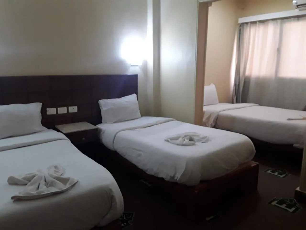 Bed in Regency Hotel