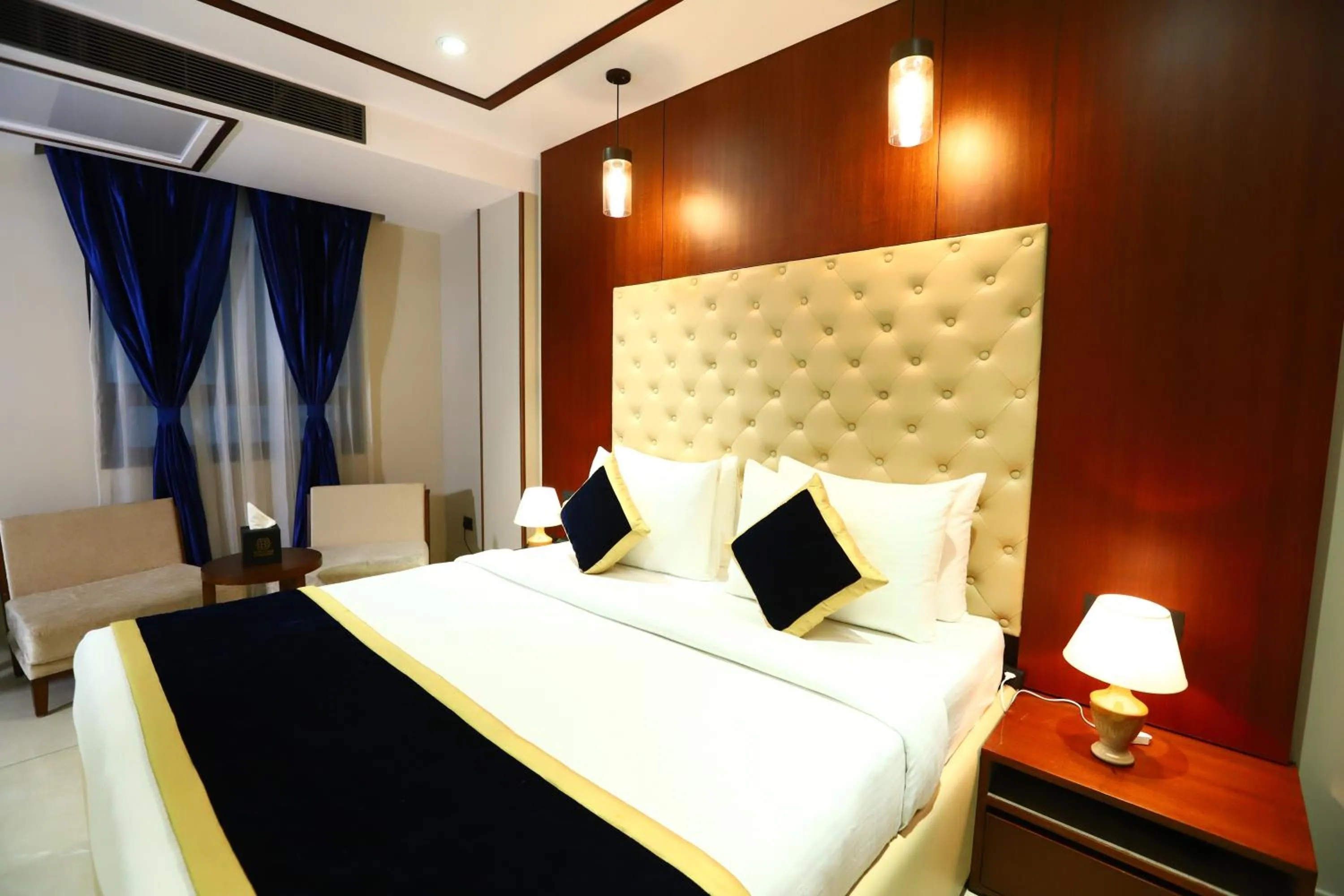 Photo of the whole room, Bed in Sanca International Hotel in Patel Nagar Delhi