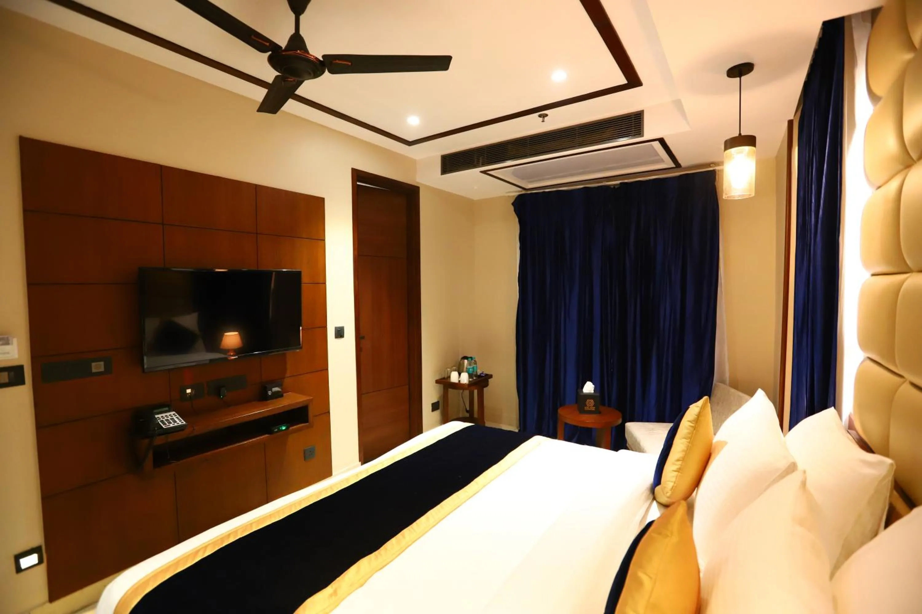 TV and multimedia, Bed in Sanca International Hotel in Patel Nagar Delhi