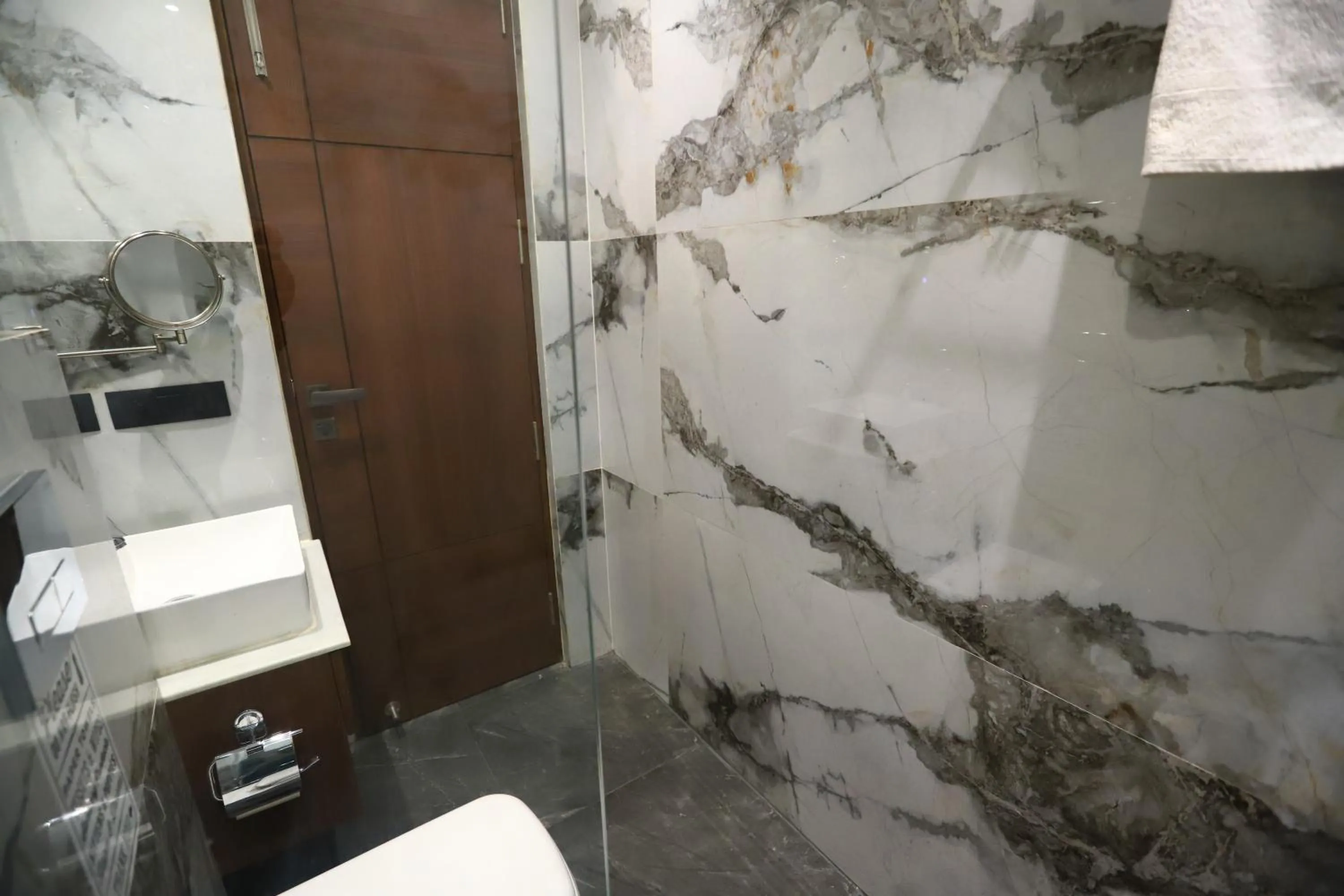 Bathroom in Sanca International Hotel in Patel Nagar Delhi