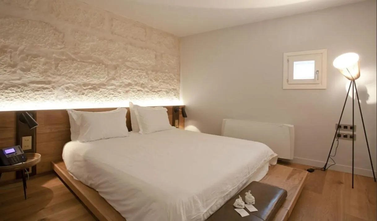 Bed in Puro Grand Hotel