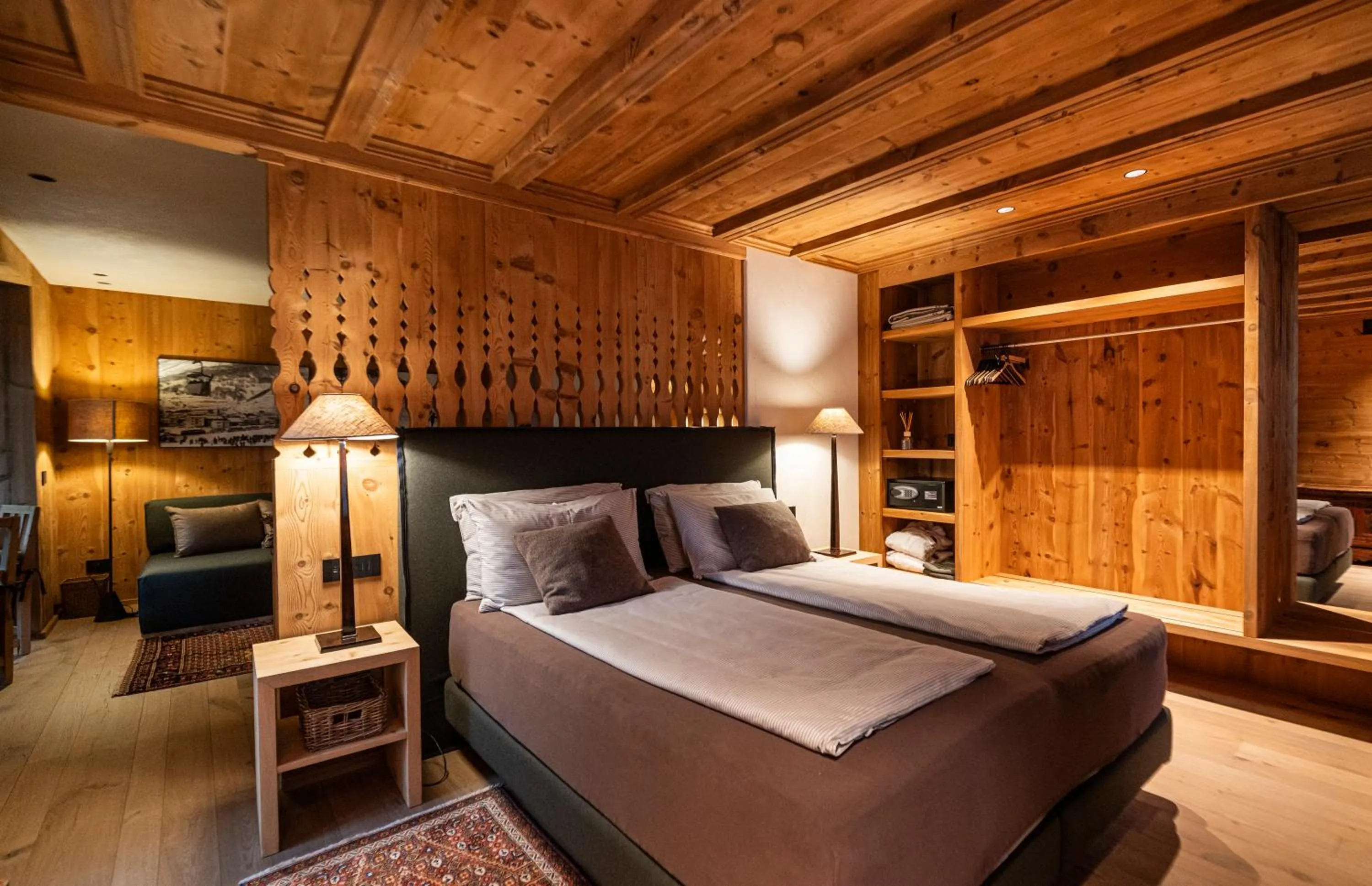 Photo of the whole room, Bed in La Genzianella Bormio