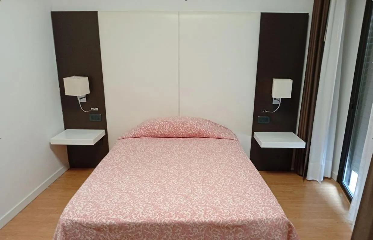 Photo of the whole room, Bed in Tiby Hotel