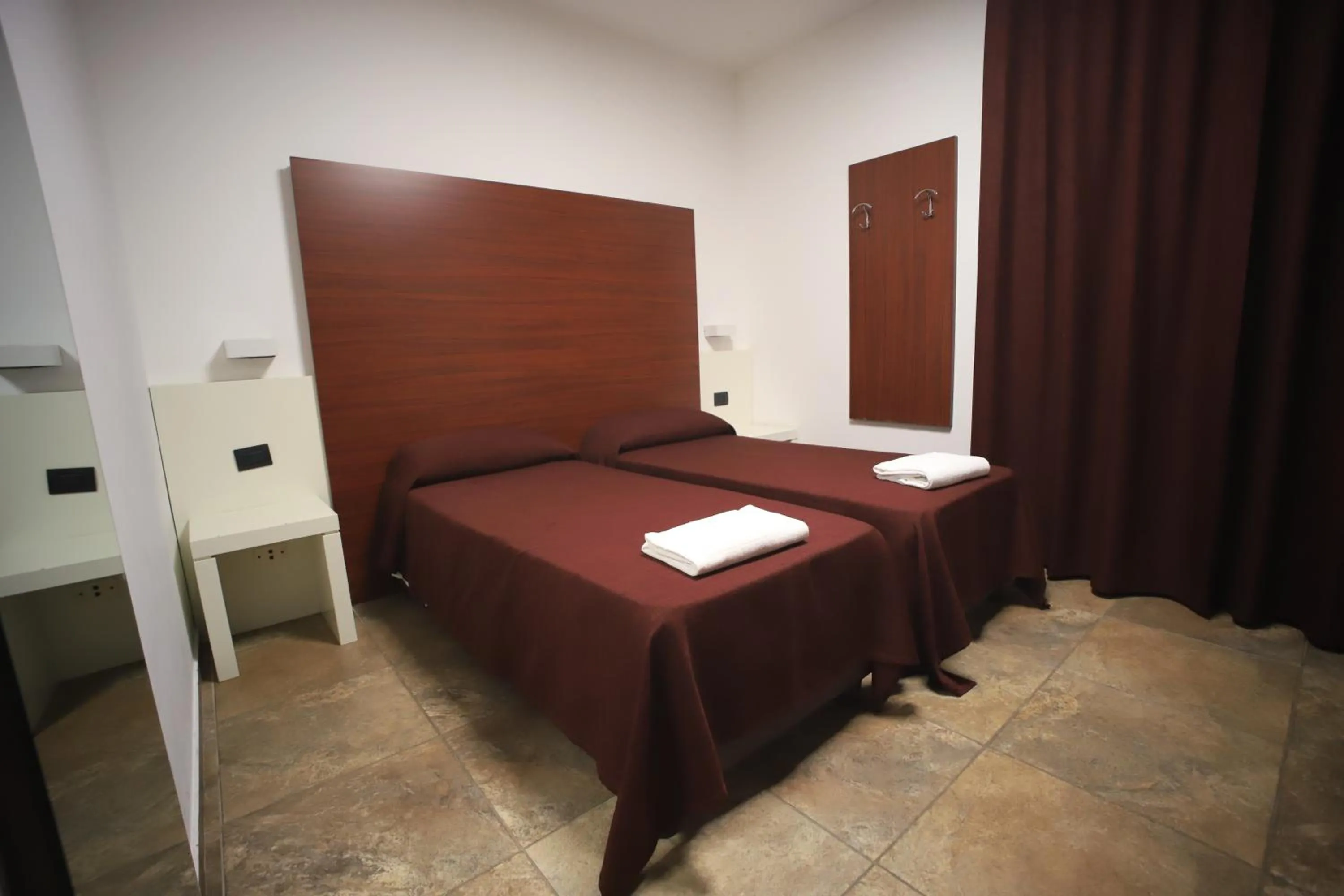 Photo of the whole room, Bed in Tiby Hotel