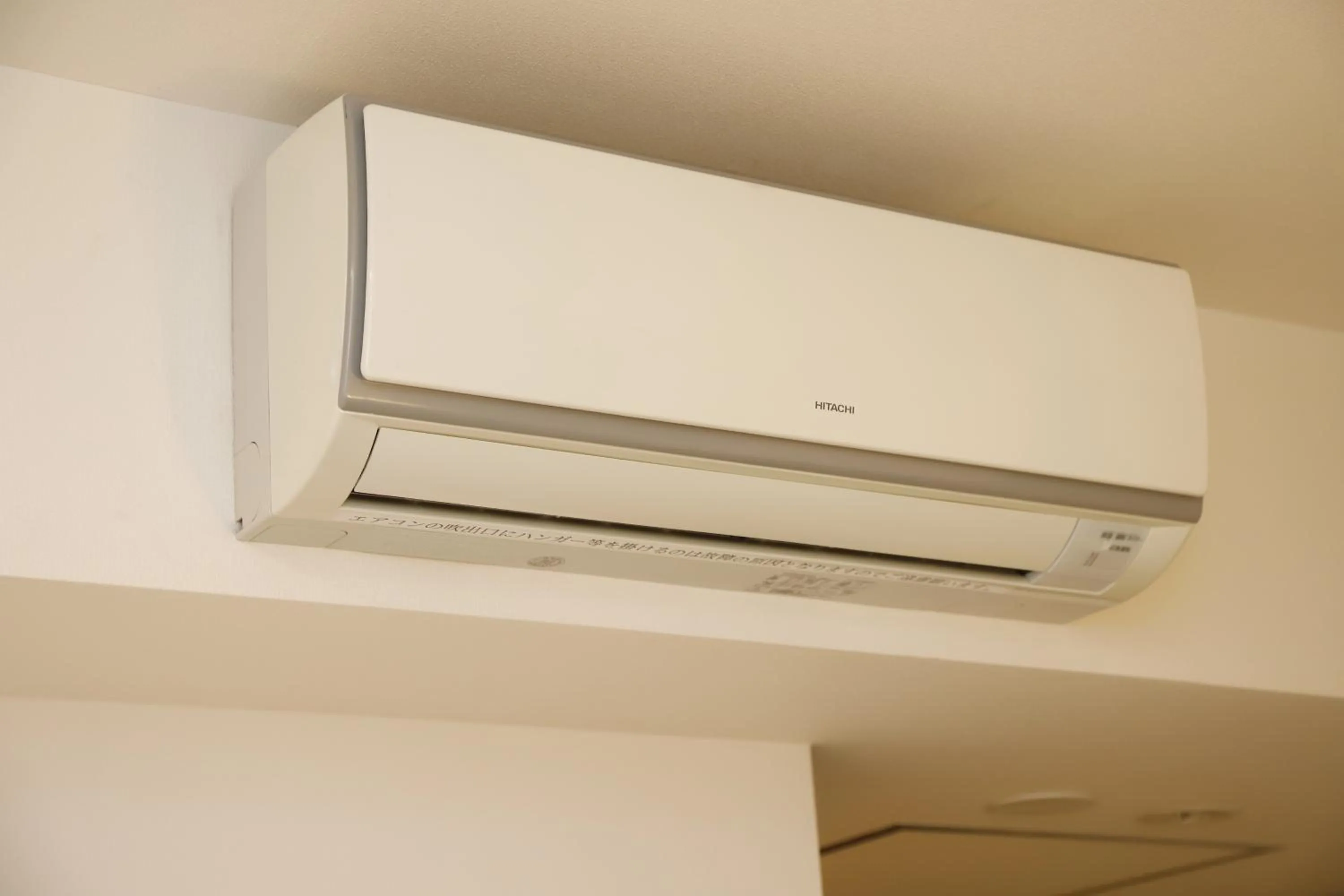 air conditioner, TV/Entertainment Center in KEIKYU EX INN Yokohama-Station East -Yokohama Water front