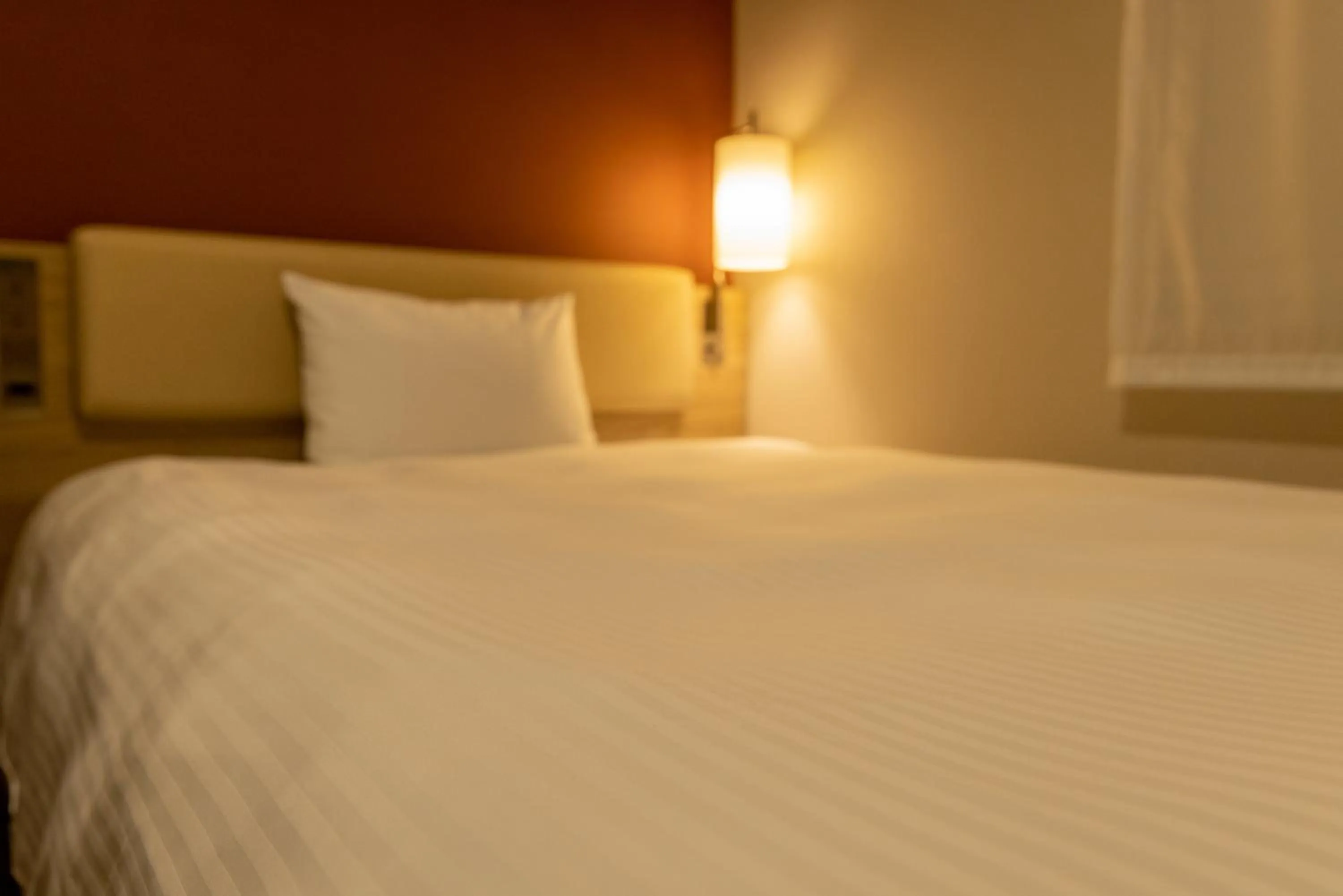 Bed in KEIKYU EX INN Keikyu Kawasaki-Station