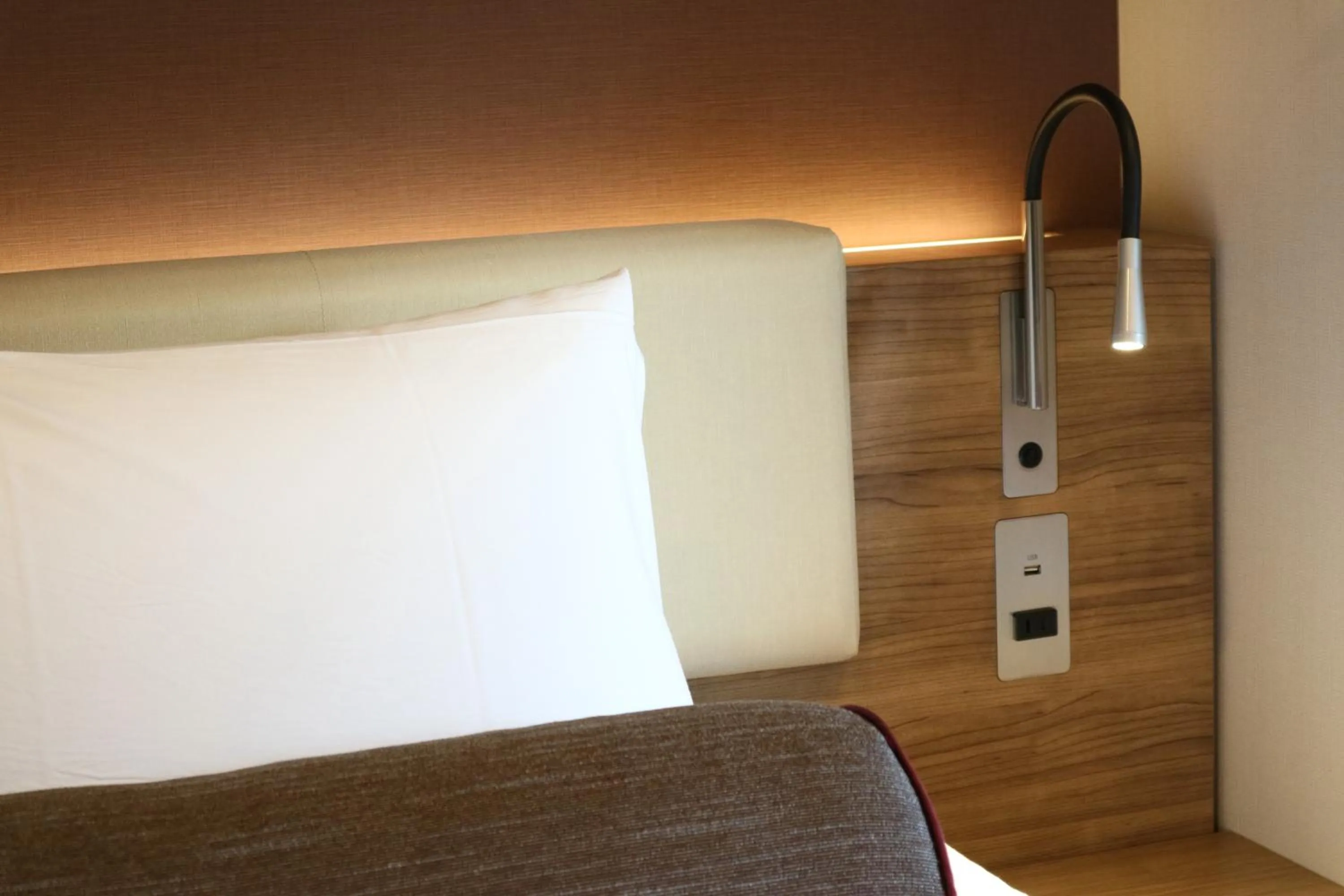 Bed in KEIKYU EX INN Higashi-Ginza