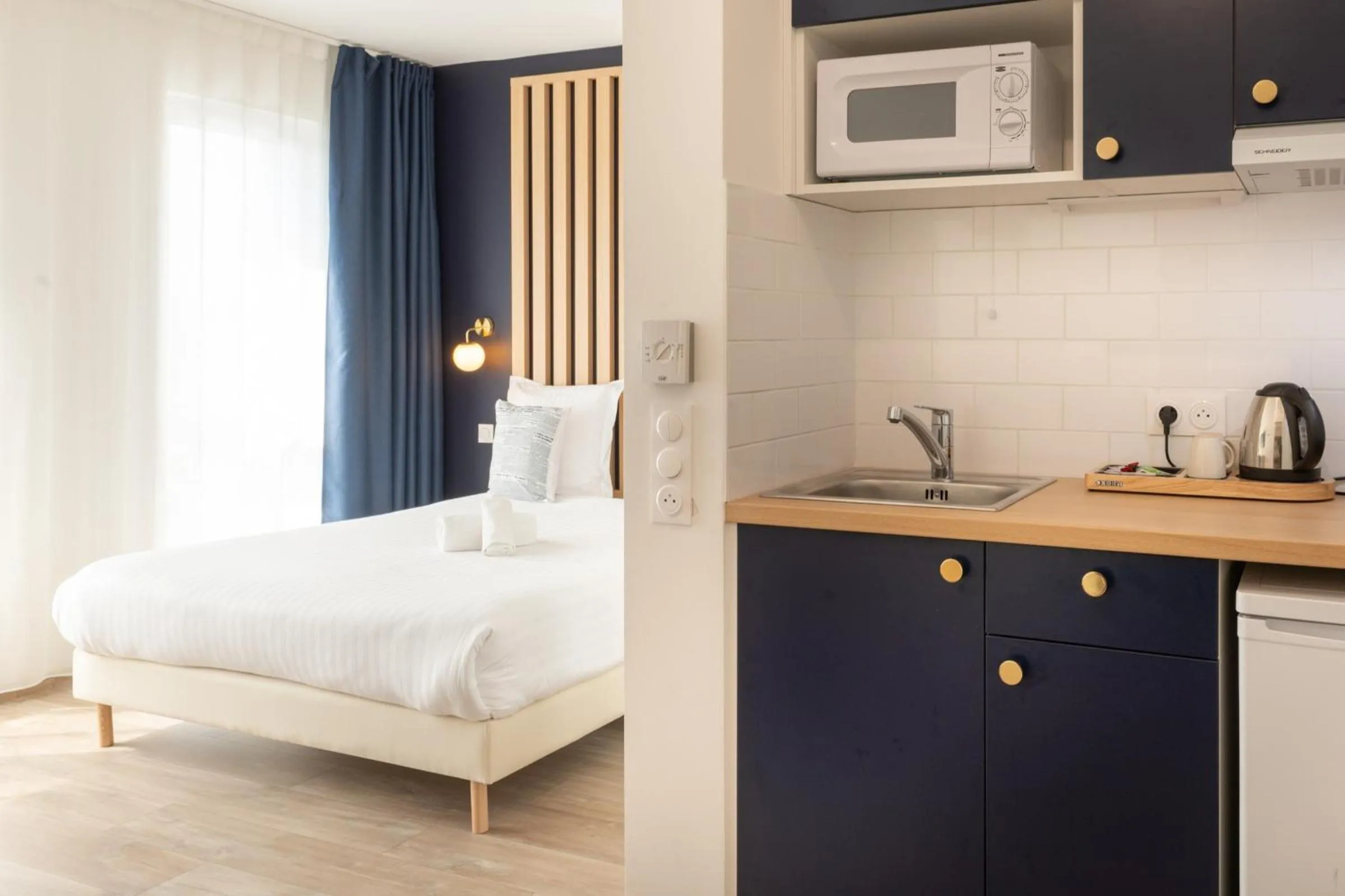 Kitchen or kitchenette in The Originals Résidence Le Monde Paris Ivry Confluence