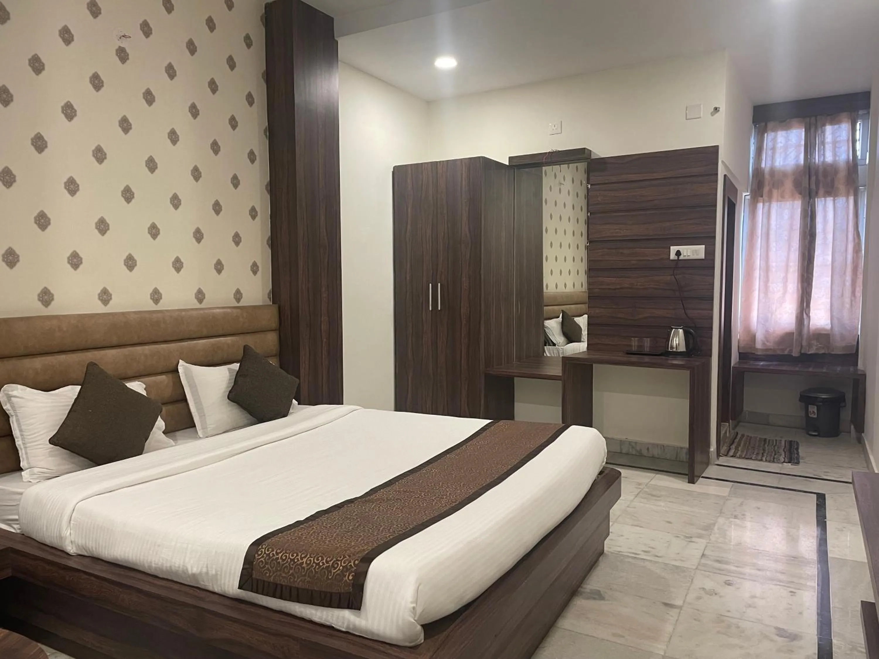 Bed in Hotel Royal Embassy