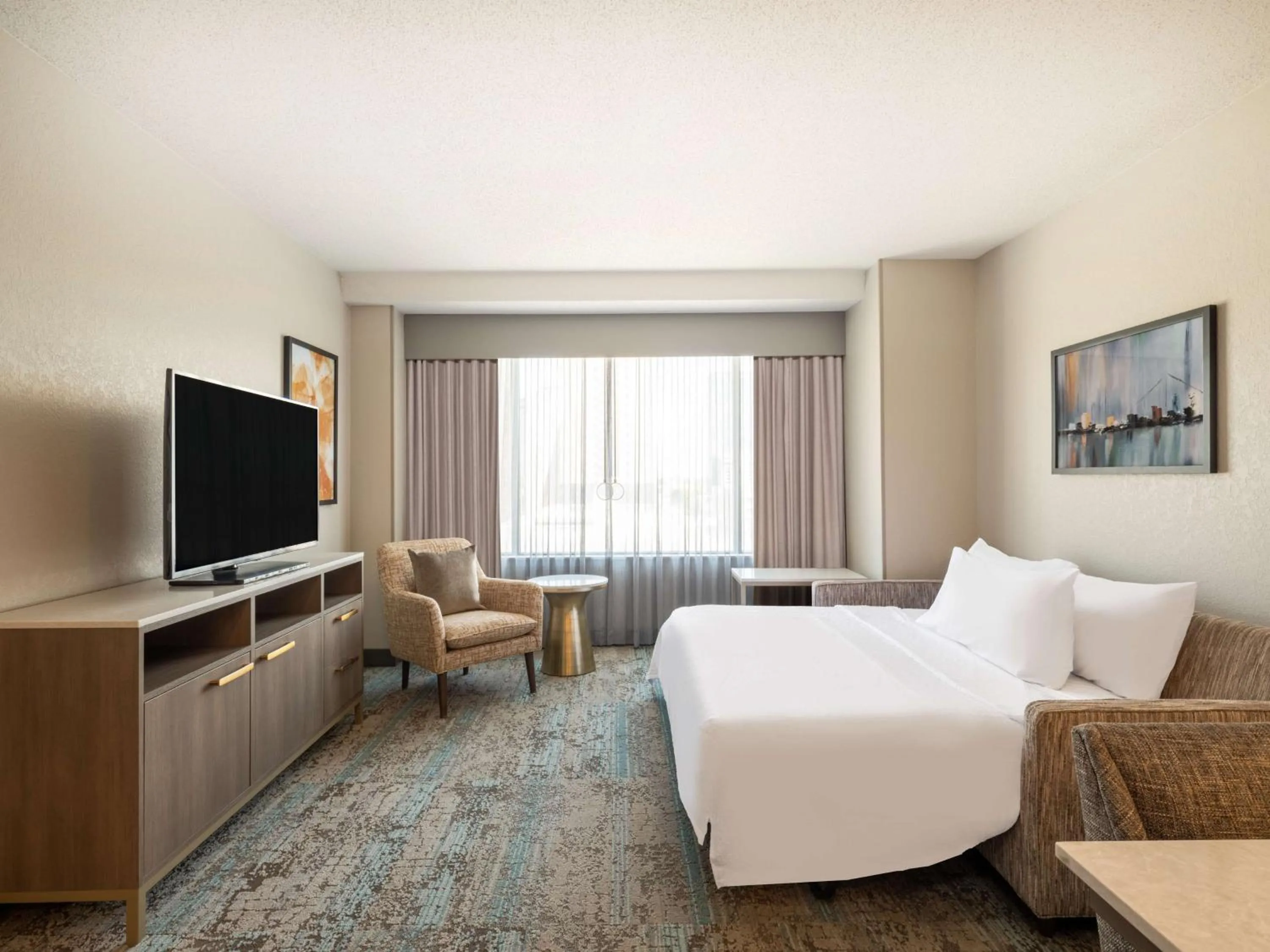 Living room, Bed in Homewood Suites By Hilton Toledo Downtown