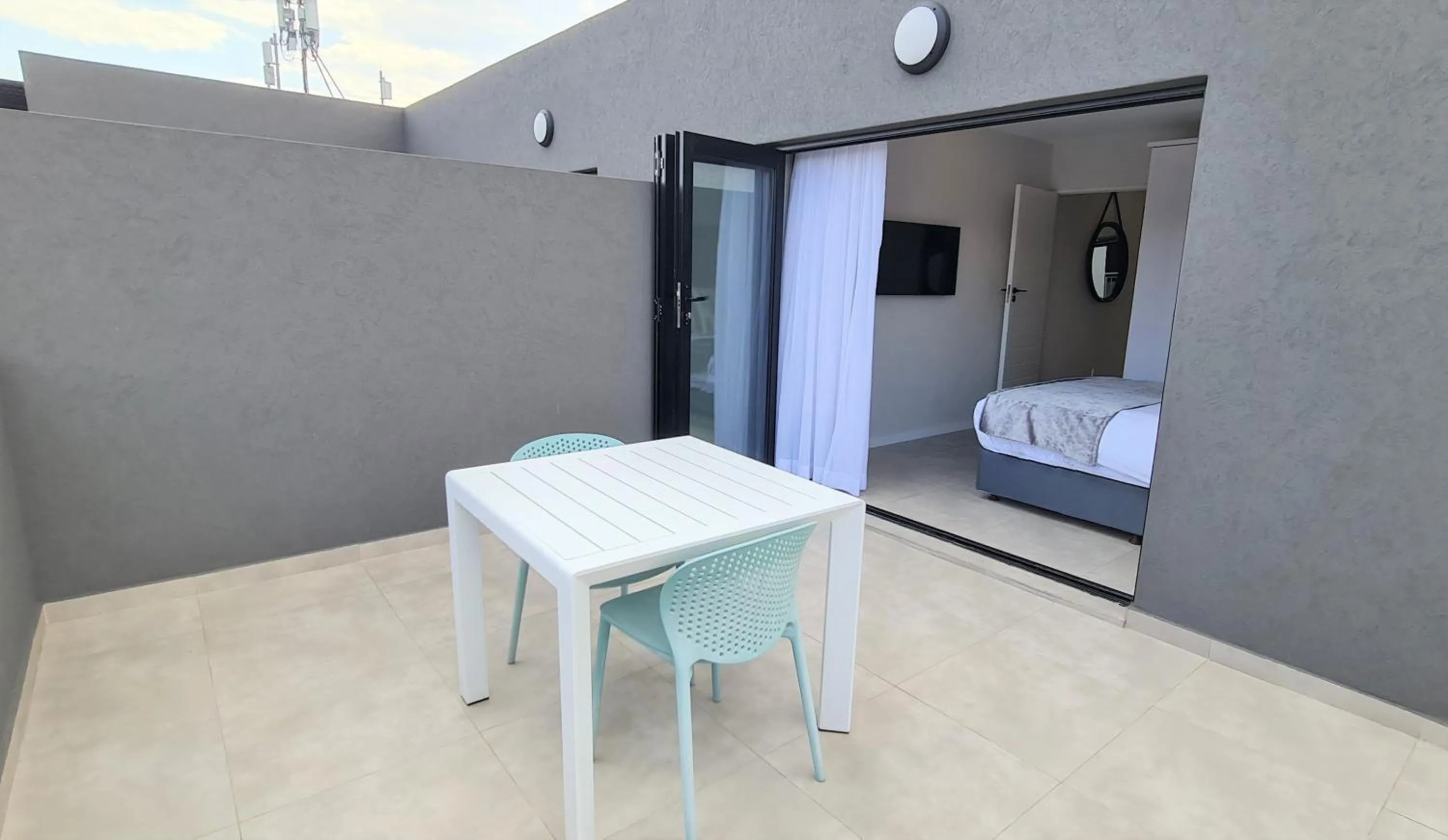 Patio, Bed in MINT Apartments Greenside