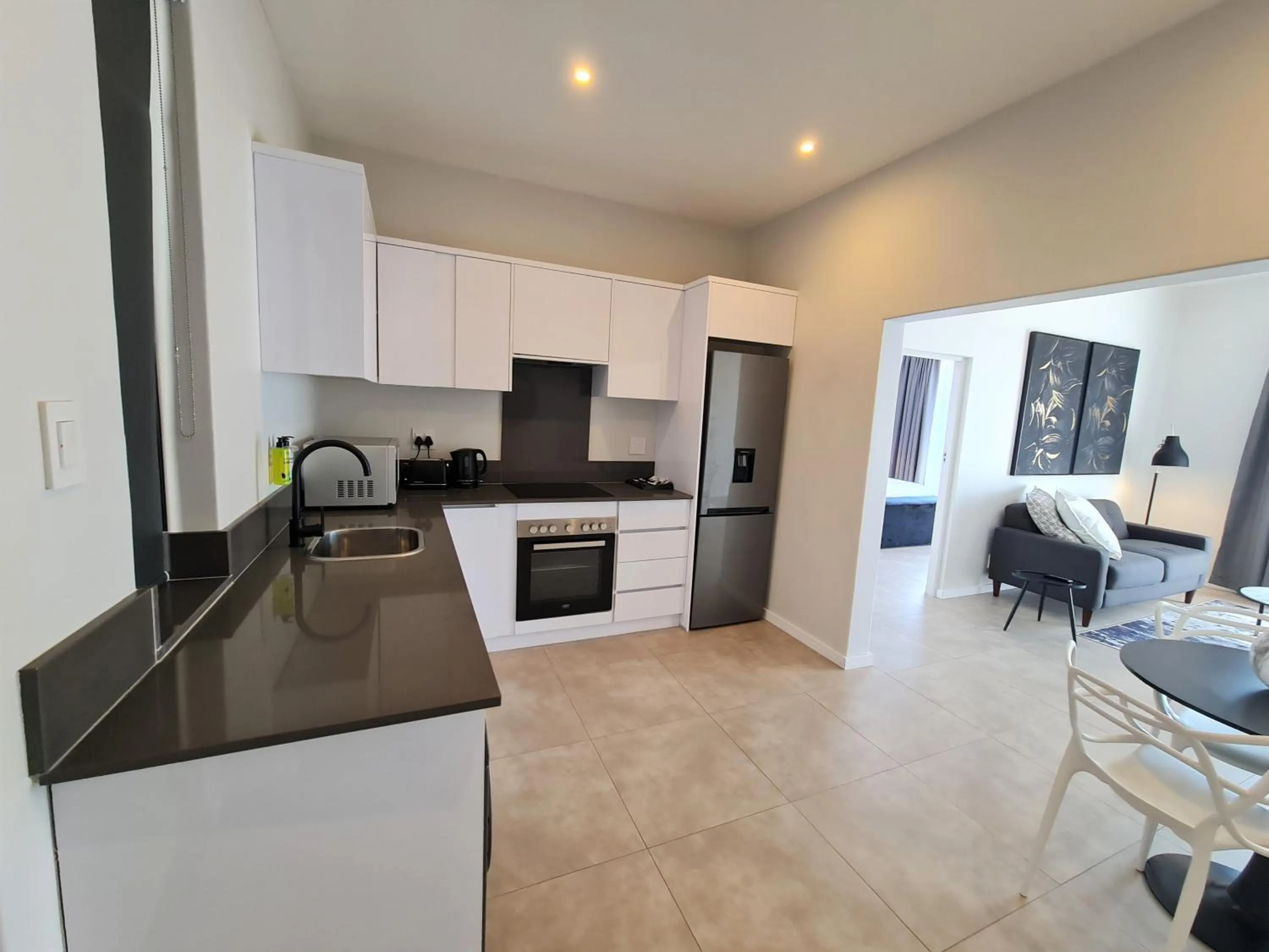 Kitchen or kitchenette in MINT Apartments Greenside