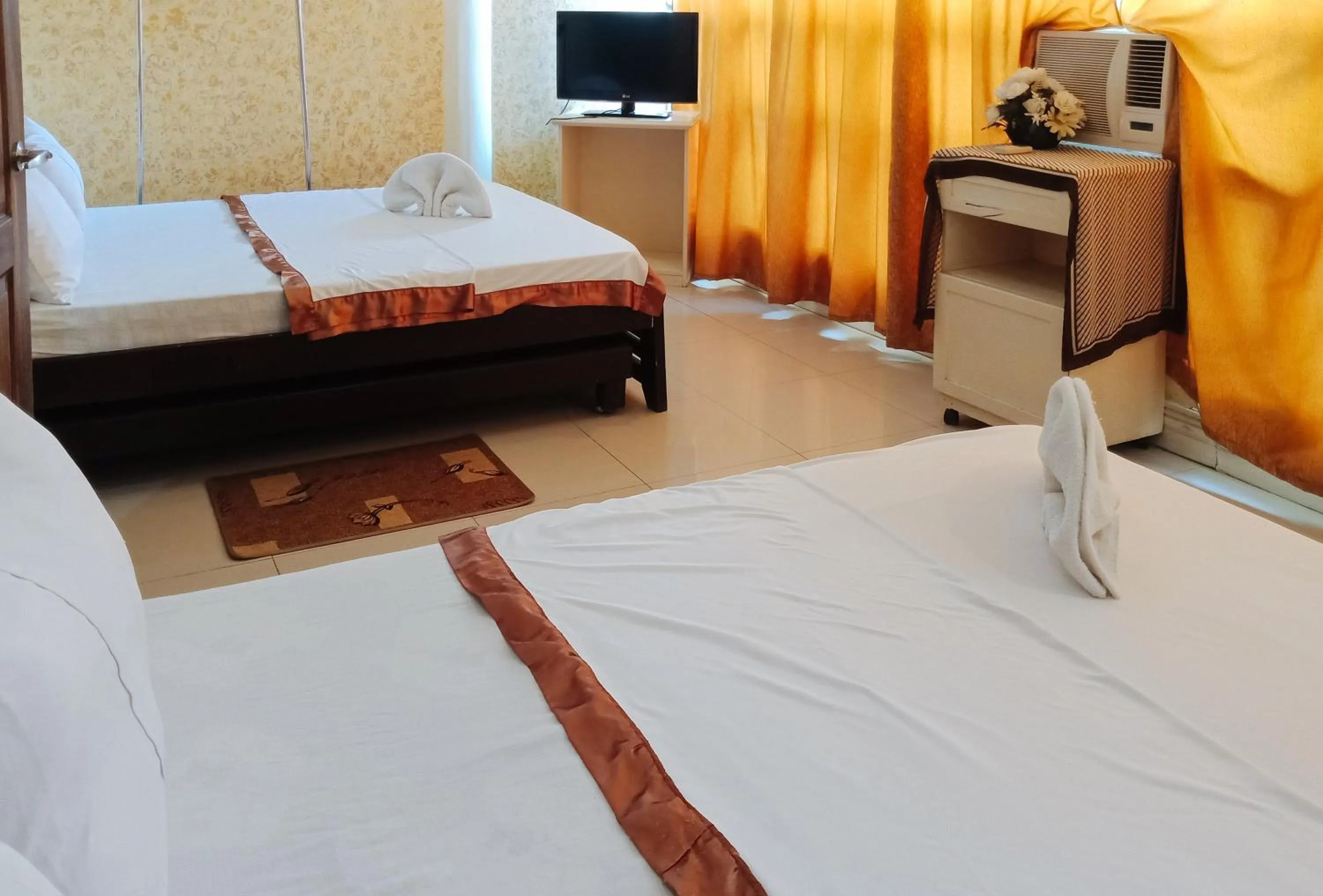 Bedroom in Villa Asuncion Country Inn and Resort Iloilo by RedDoorz