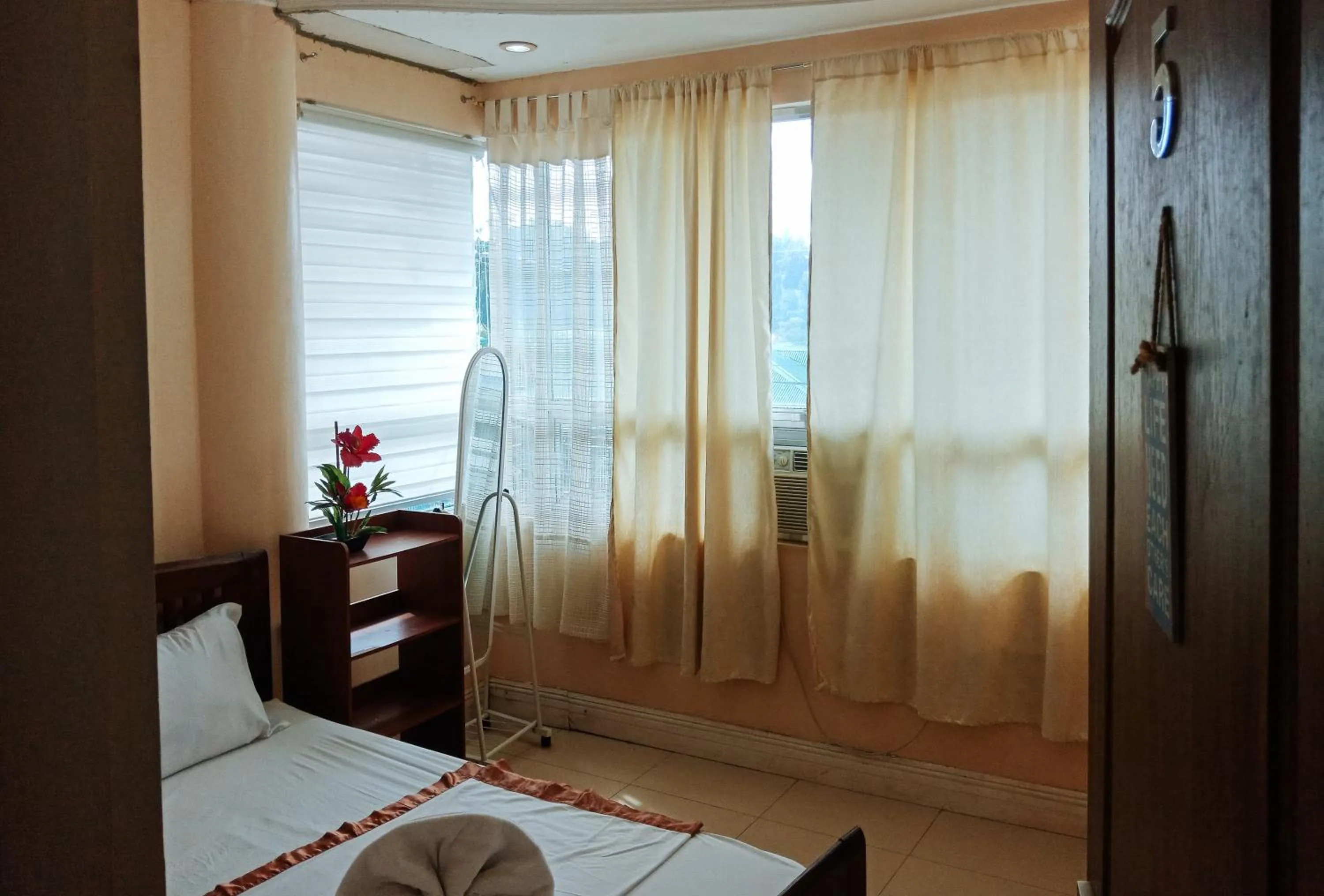 Bedroom in Villa Asuncion Country Inn and Resort Iloilo by RedDoorz