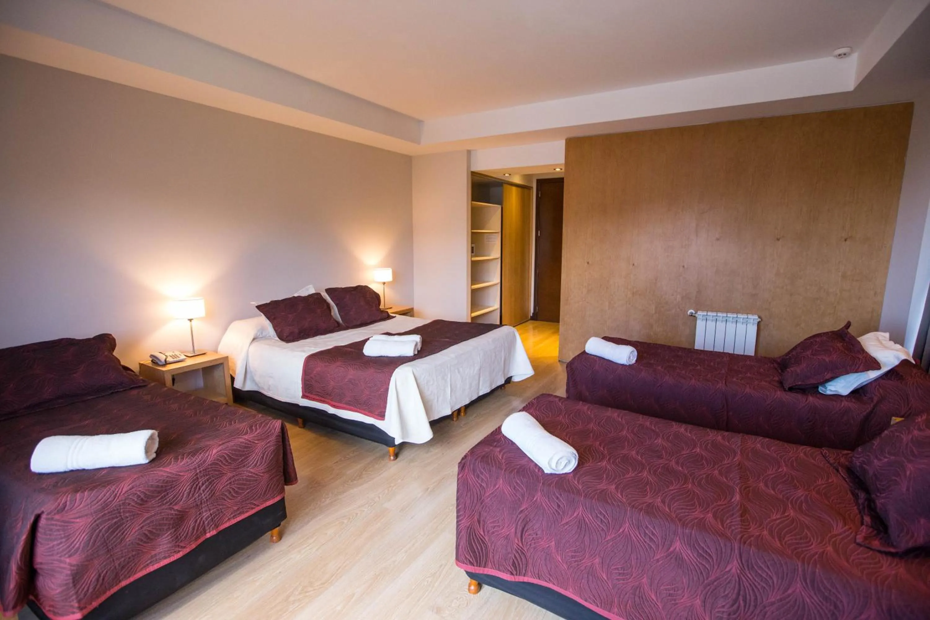 Photo of the whole room, Bed in Hotel Bariloche Suites