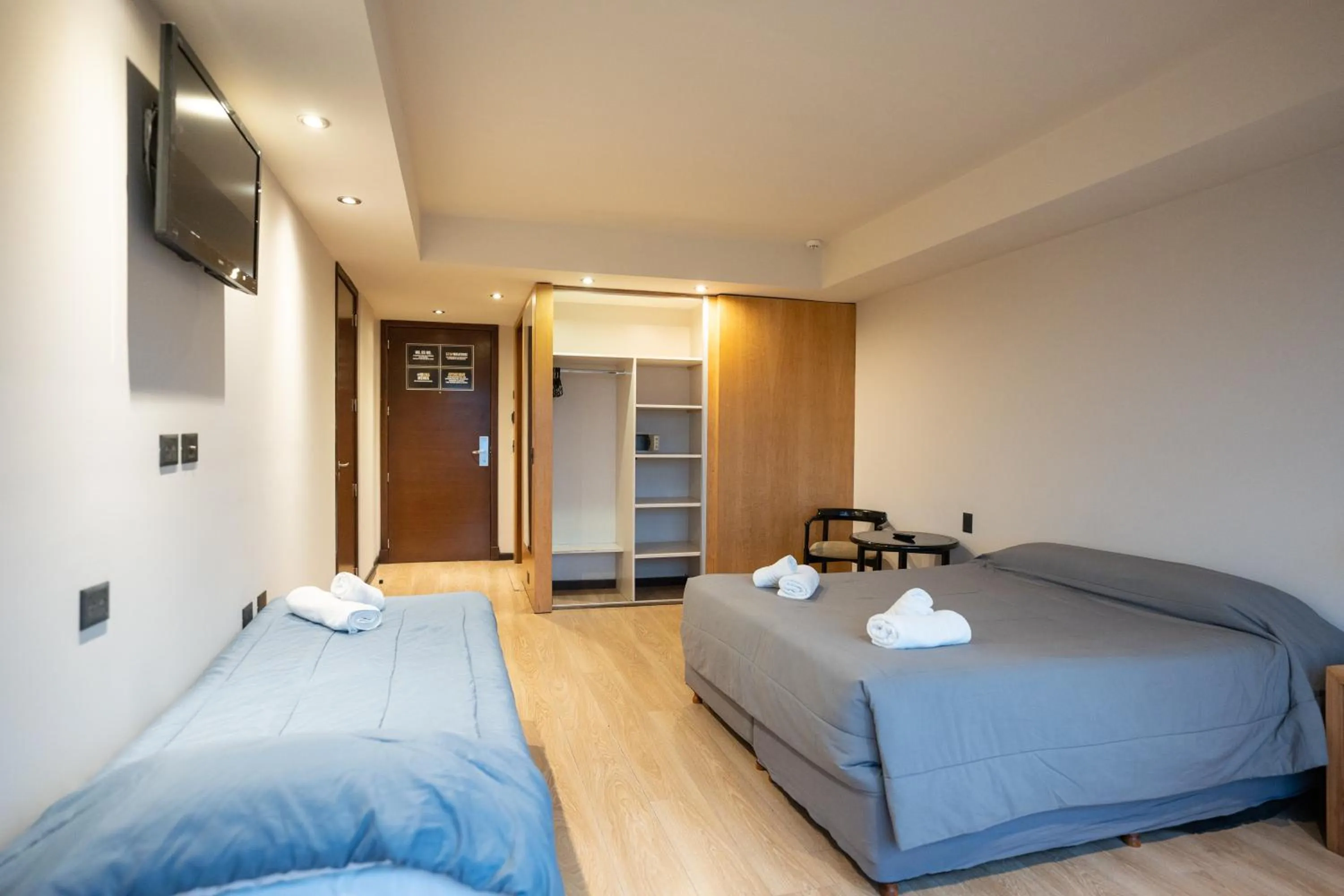 Bed in Hotel Bariloche Suites