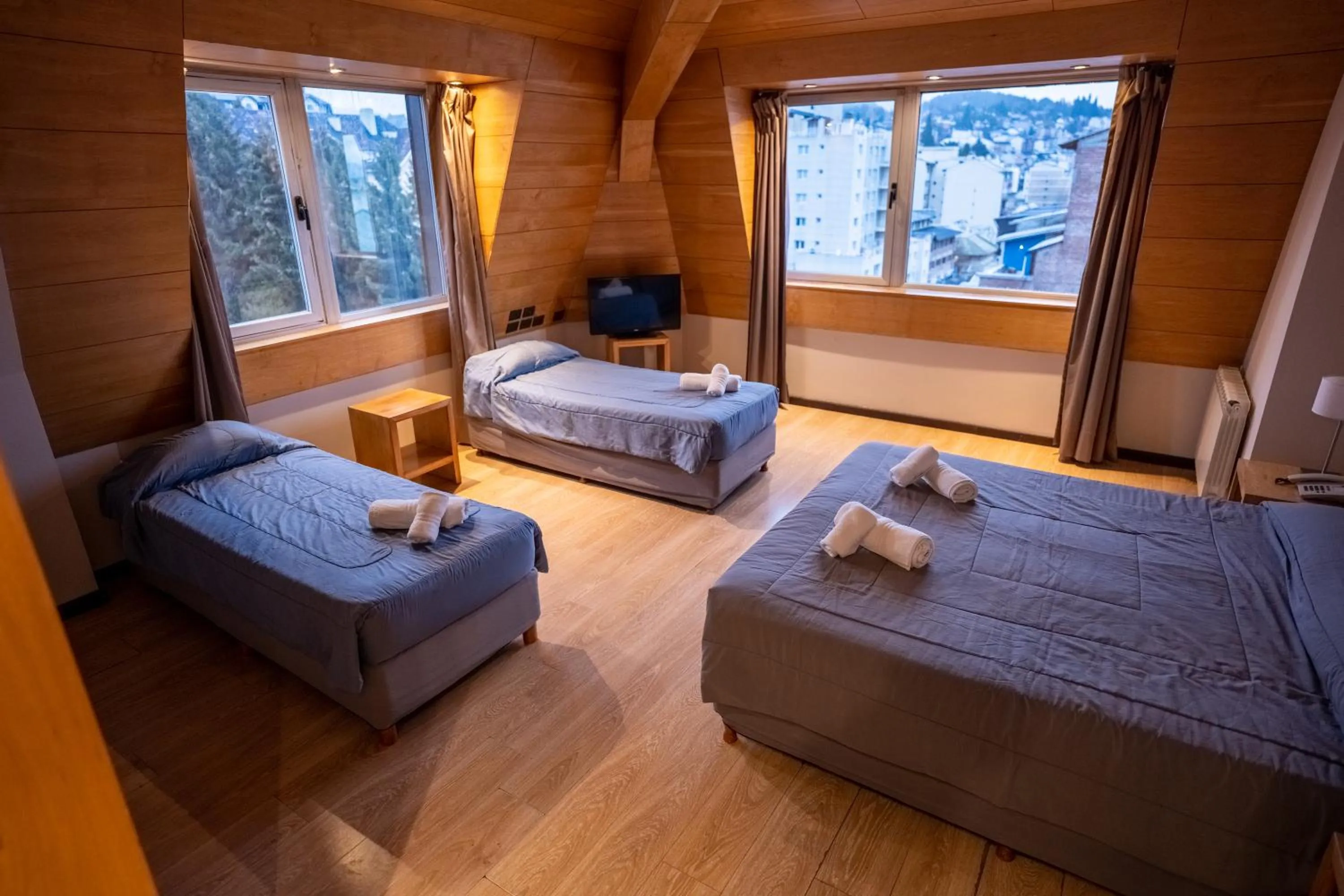 Bed in Hotel Bariloche Suites