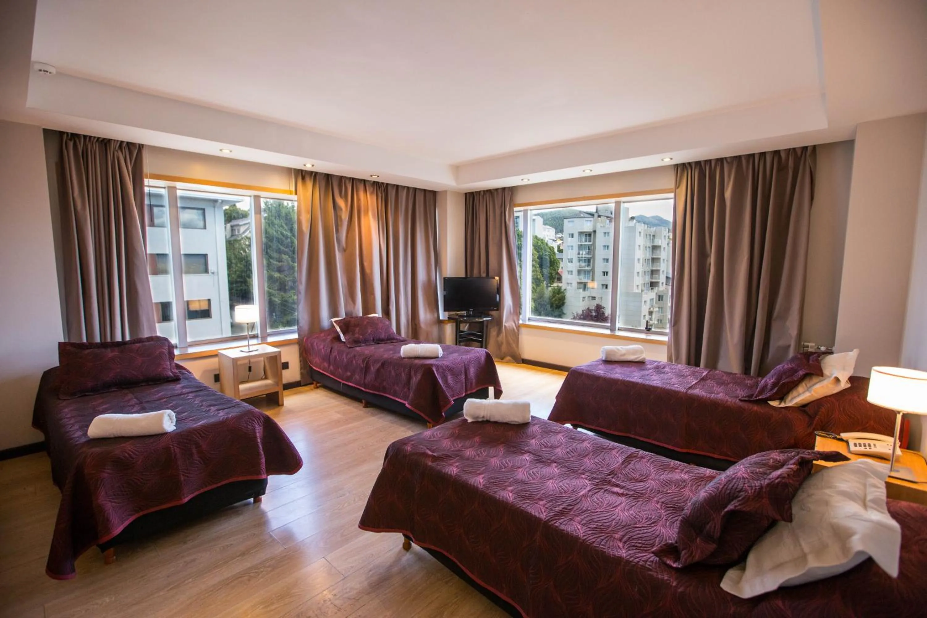 Bed in Hotel Bariloche Suites