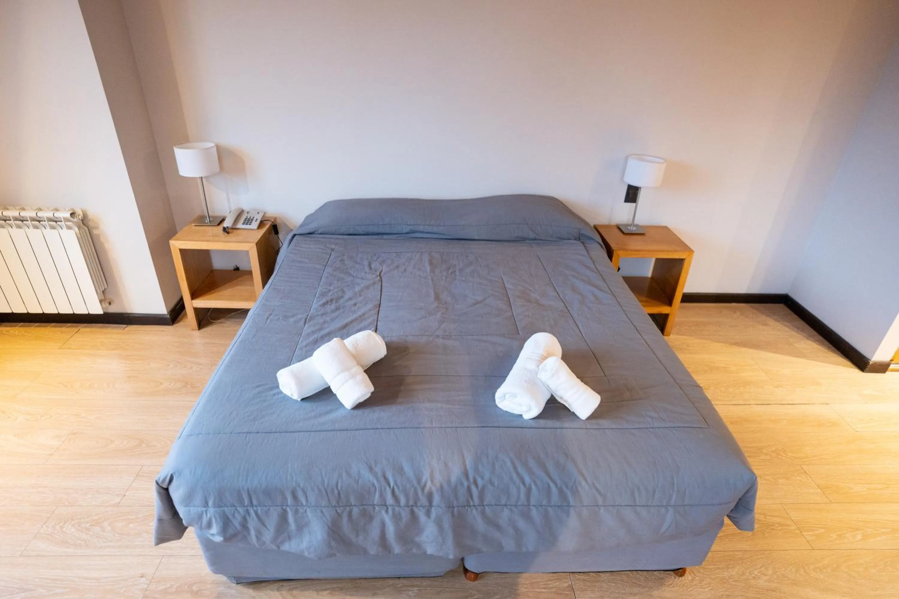 Bed in Hotel Bariloche Suites