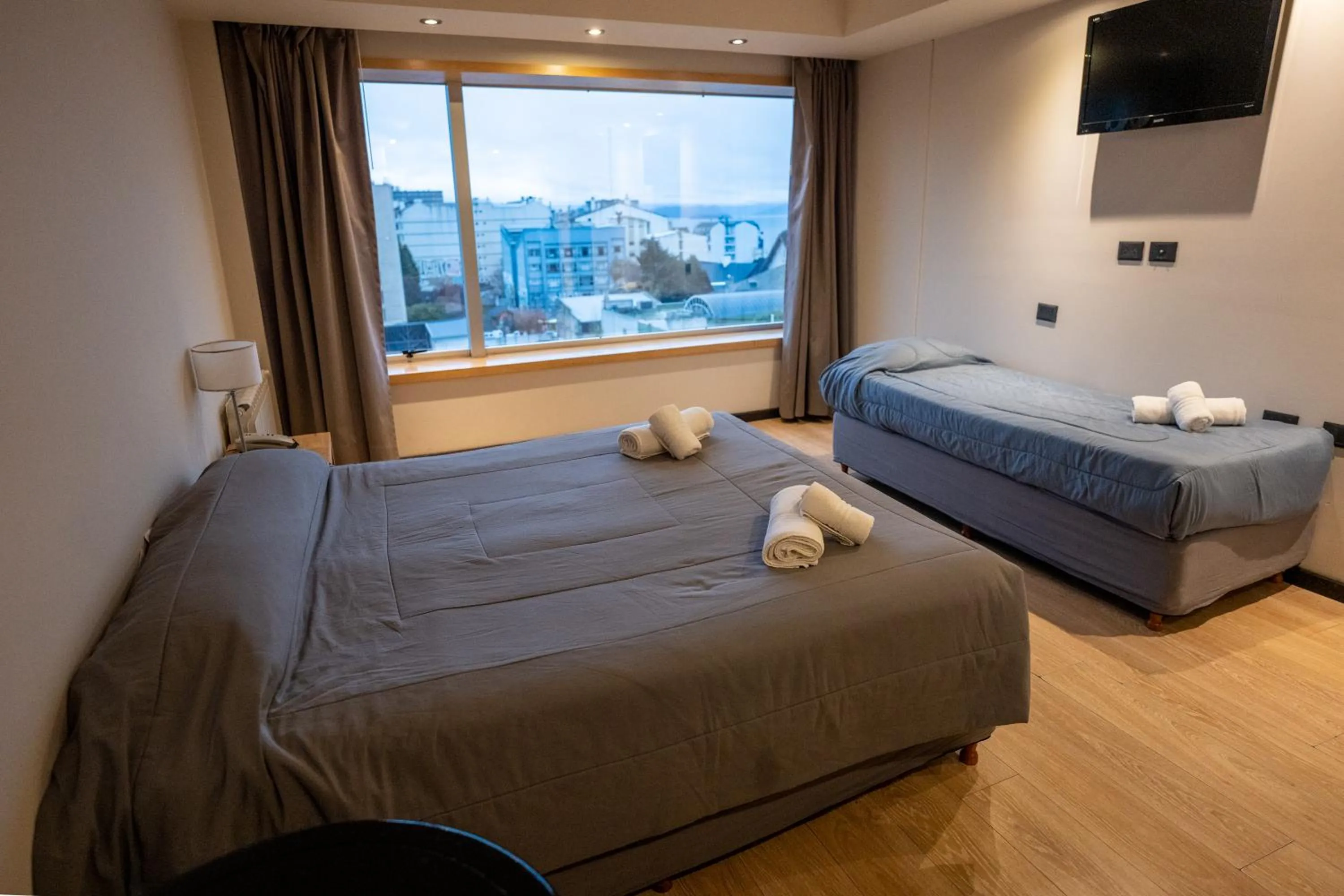 Bed in Hotel Bariloche Suites