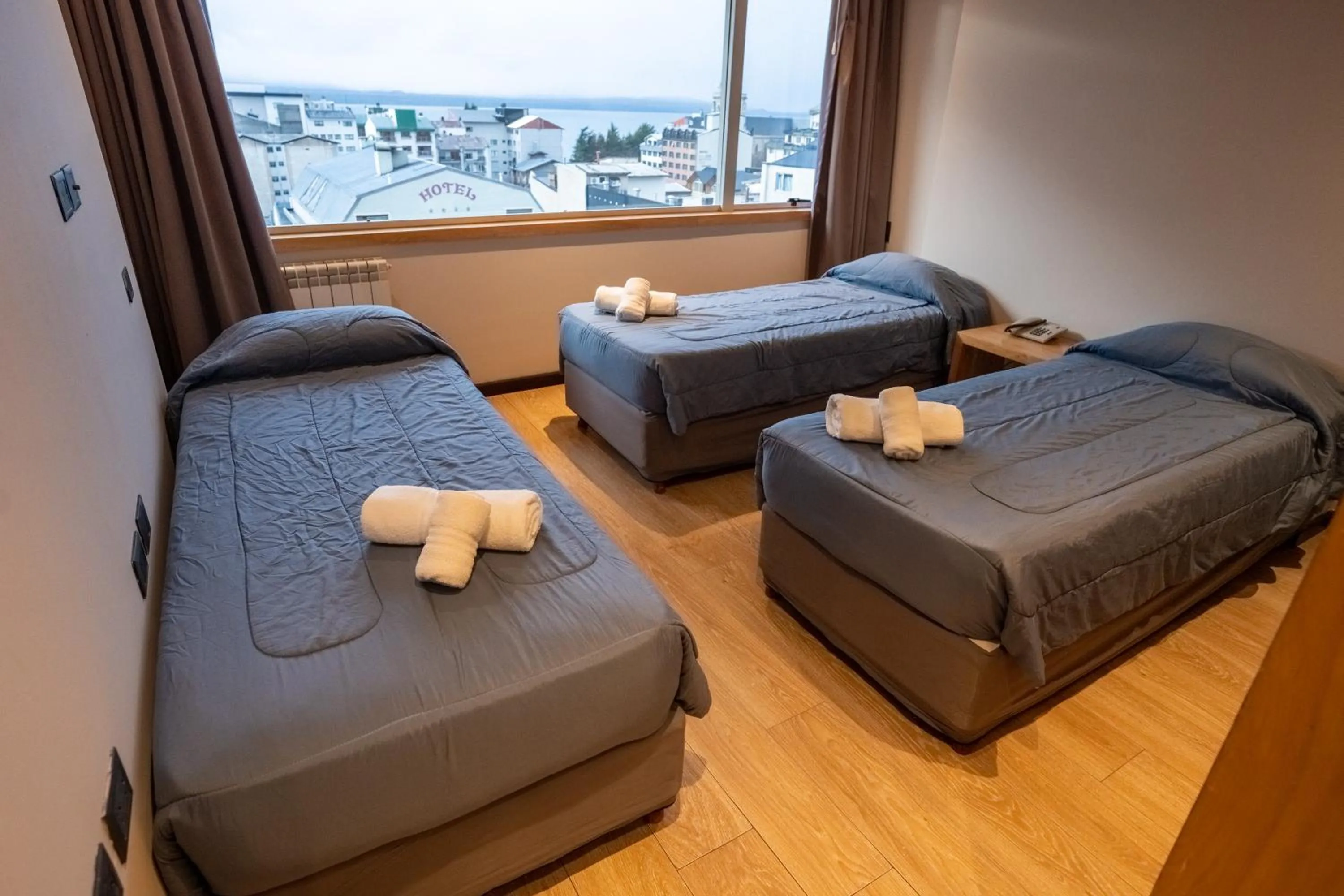 Bed in Hotel Bariloche Suites