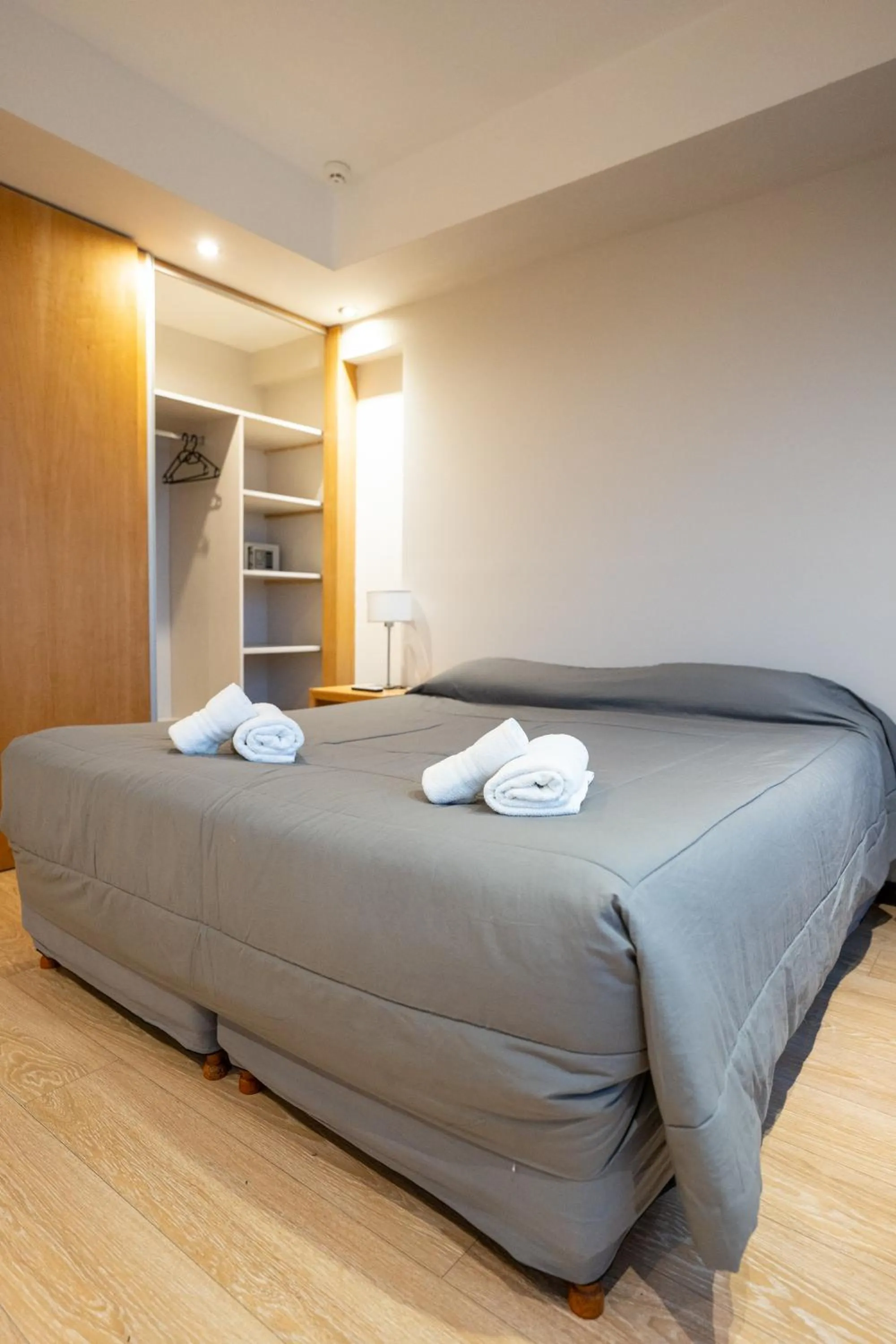 Bed in Hotel Bariloche Suites