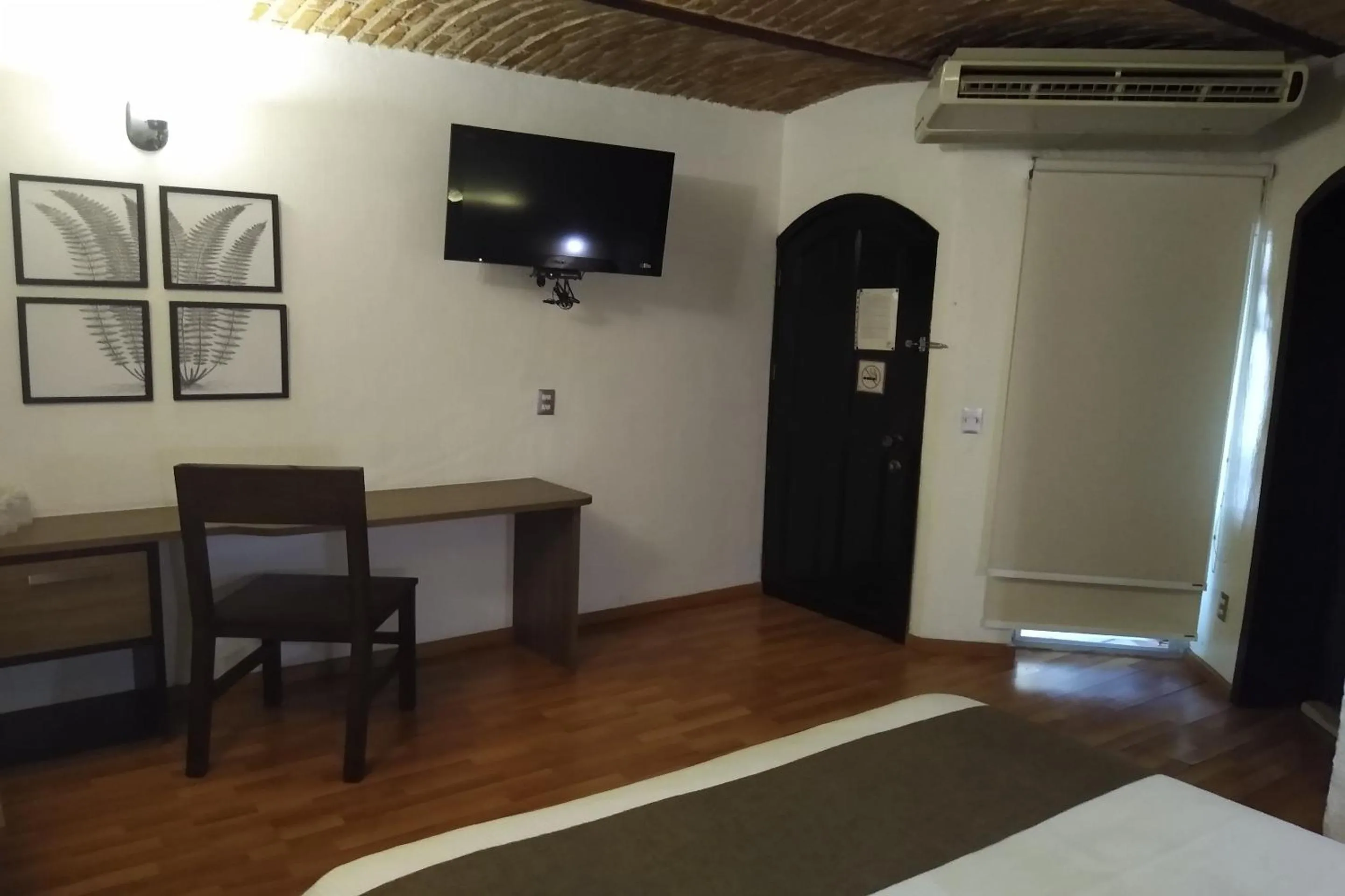 Living room, Bed in Hotel Villa Del Sol Expo