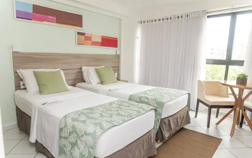 Bed in Nobile Inn Cabo Branco