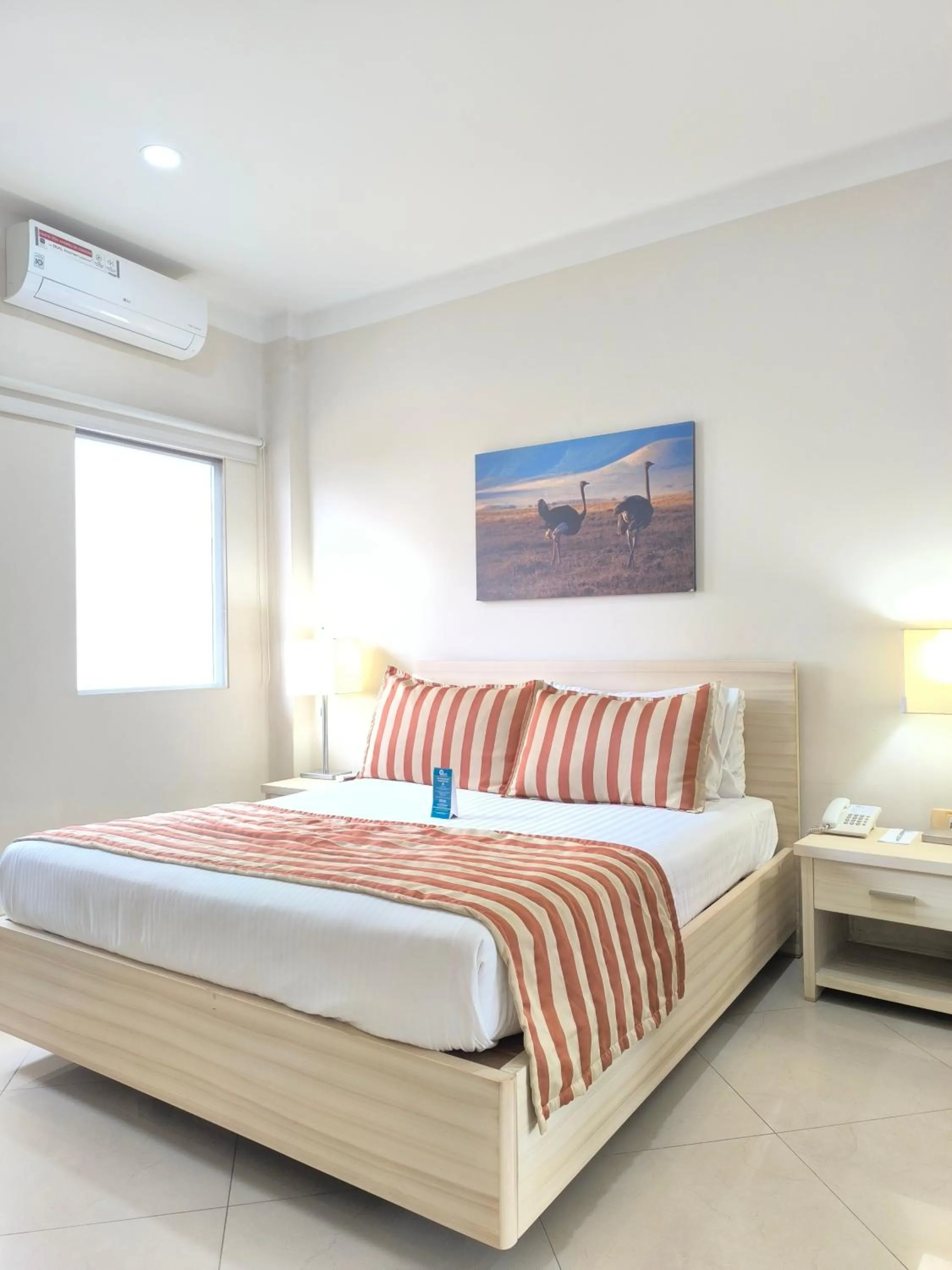 Property building, Bed in Hotel Neiva Plaza