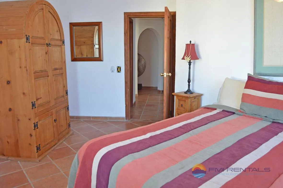 Bed in Casa Mariposa Azul by FMI Rentals