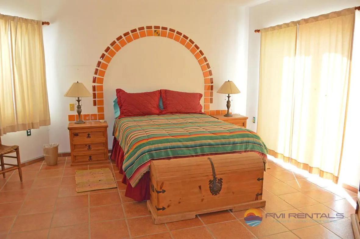Bed in Casa Mariposa Azul by FMI Rentals