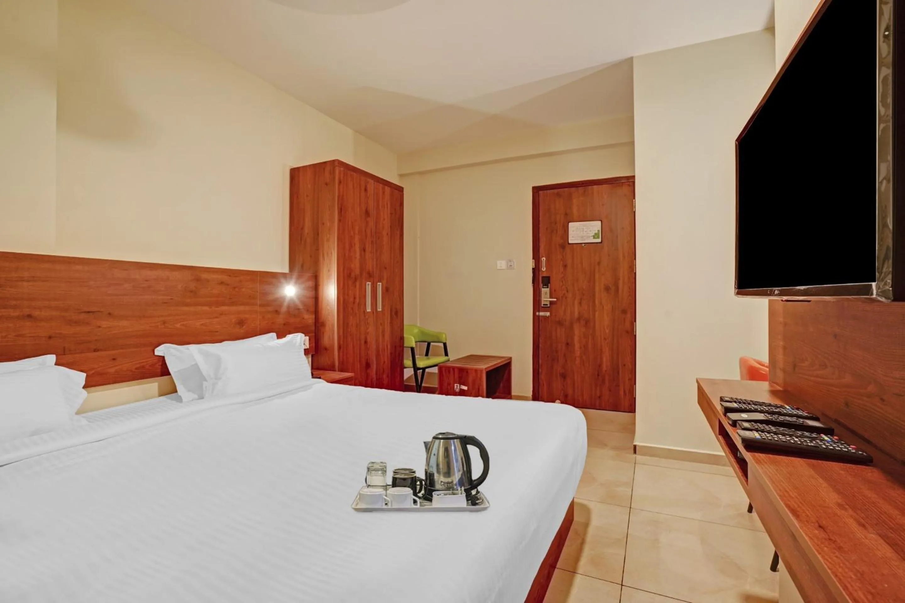 Lobby or reception, Bed in Super Townhouse Edasserys Sea Pearl