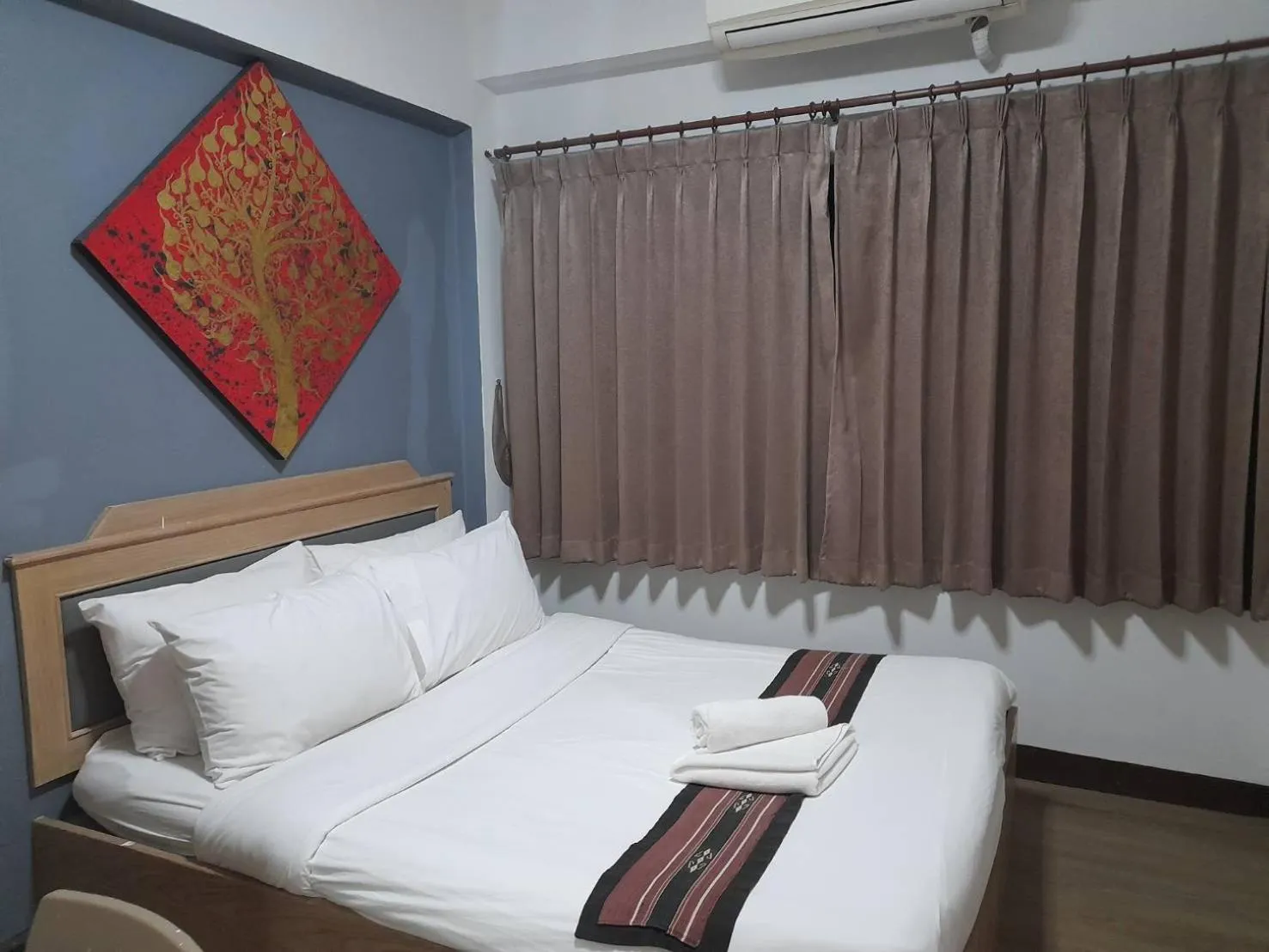 Bed in Home Place Hotel