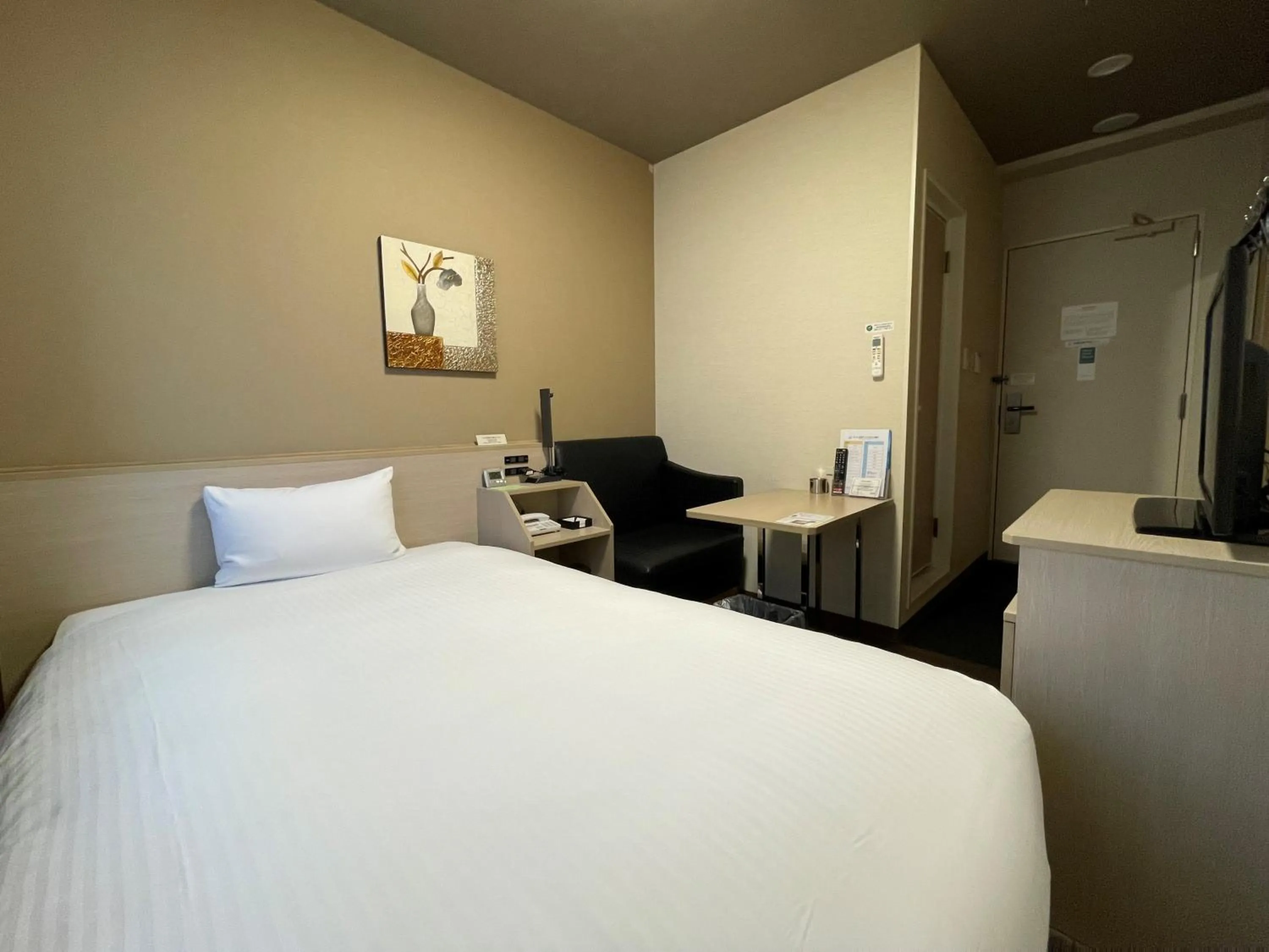 Photo of the whole room, Bed in Hotel Route-Inn Miyako