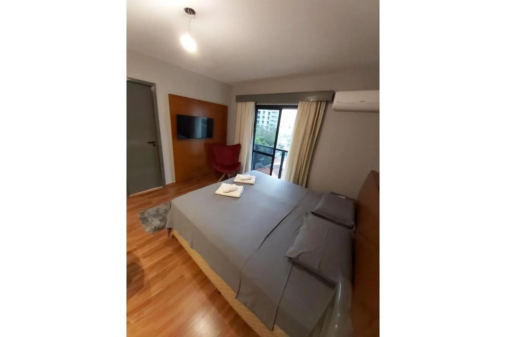 Bed in Elegant Flat Jardins - Garagem, Ar Cod,