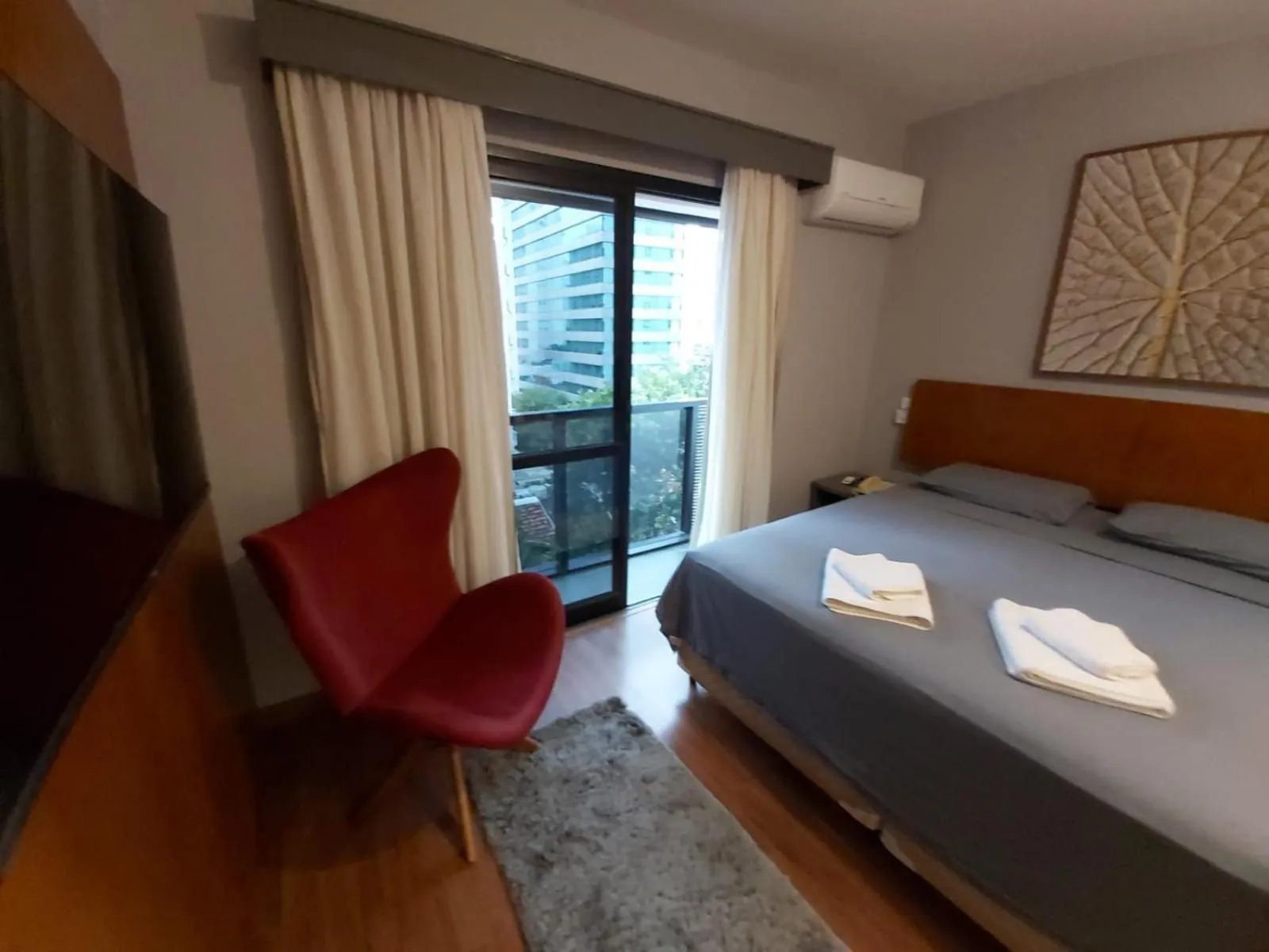 Bed in Elegant Flat Jardins - Garagem, Ar Cod,