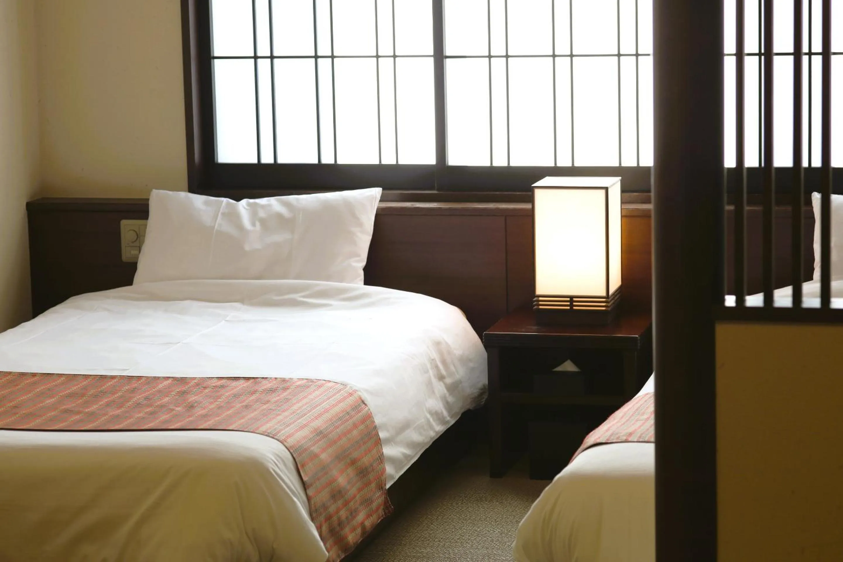 Bed in Kadensho, Arashiyama Onsen, Kyoto - Kyoritsu Resort