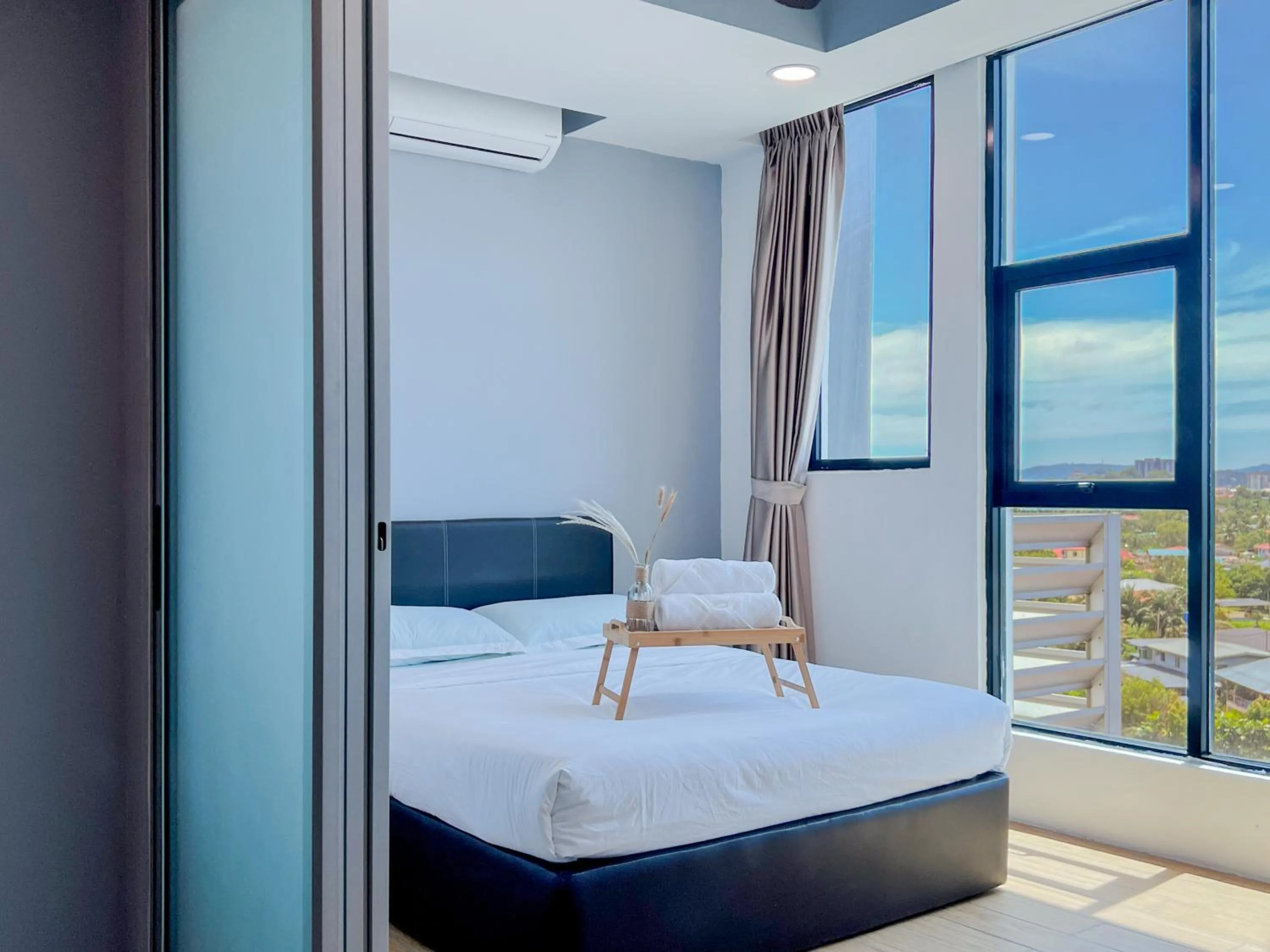 Bed in Hush Inn at ITCC Manhattan Suites