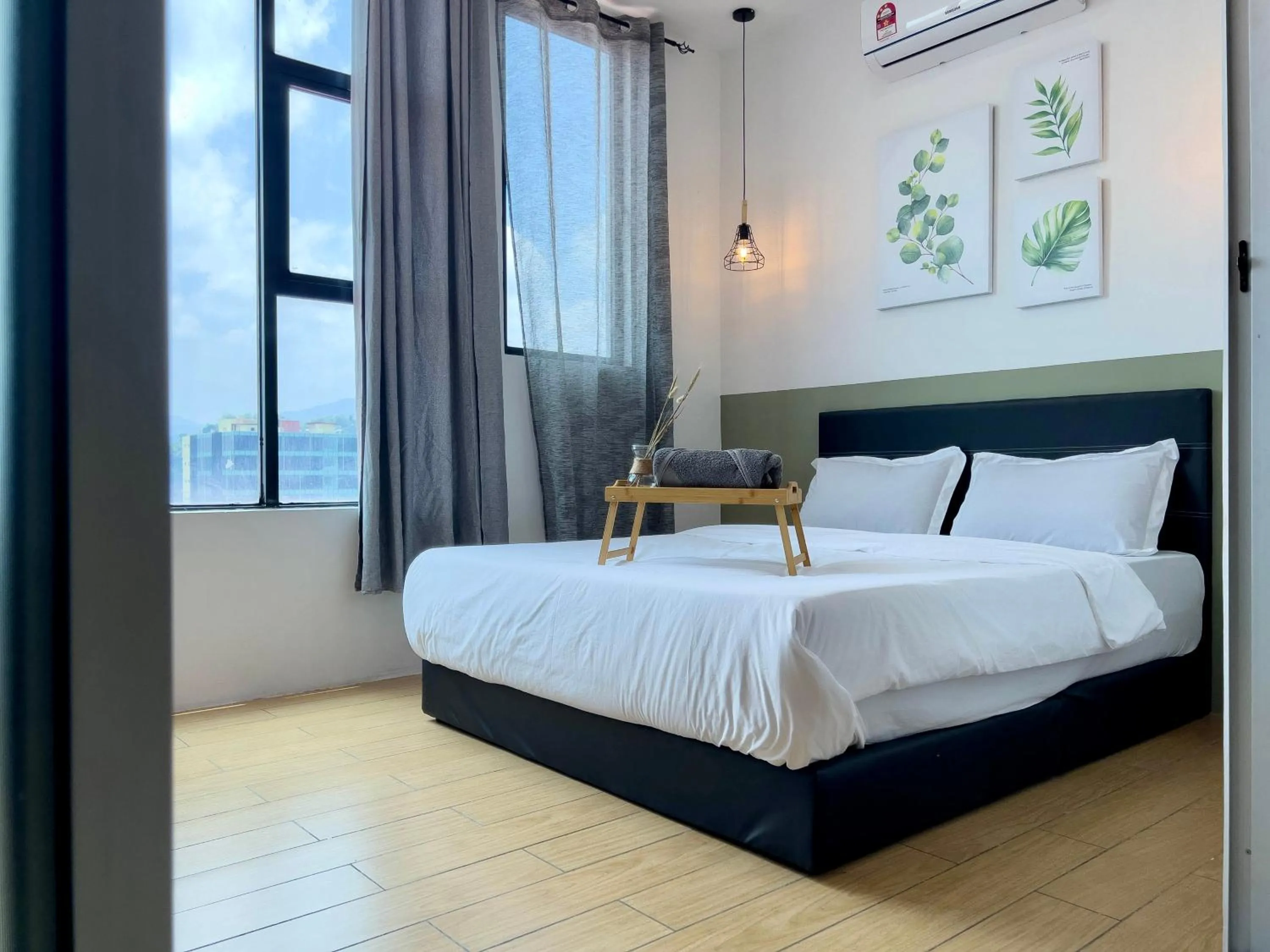 Bed in Hush Inn at ITCC Manhattan Suites