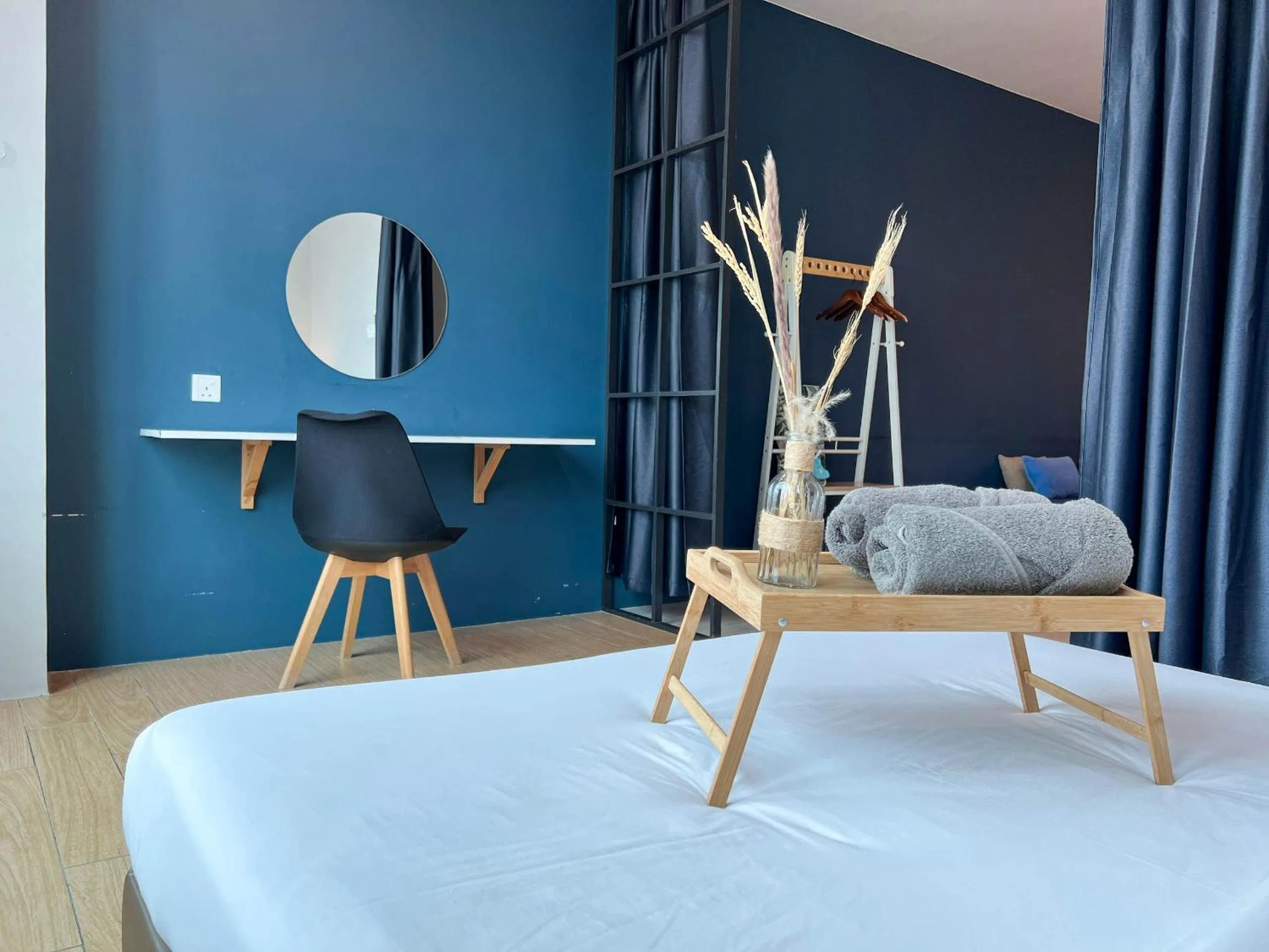 Bed in Hush Inn at ITCC Manhattan Suites