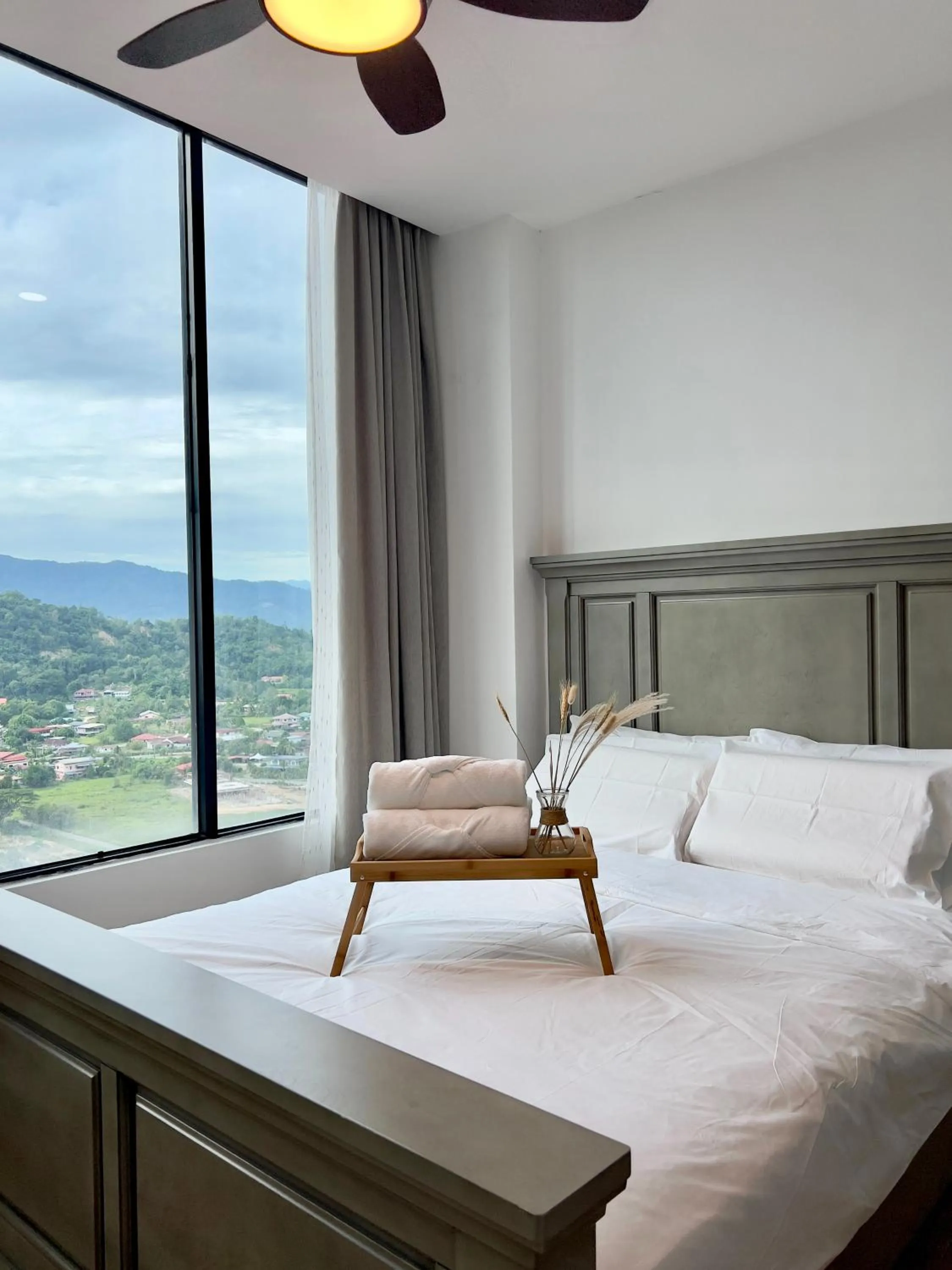 Bed in Hush Inn at ITCC Manhattan Suites