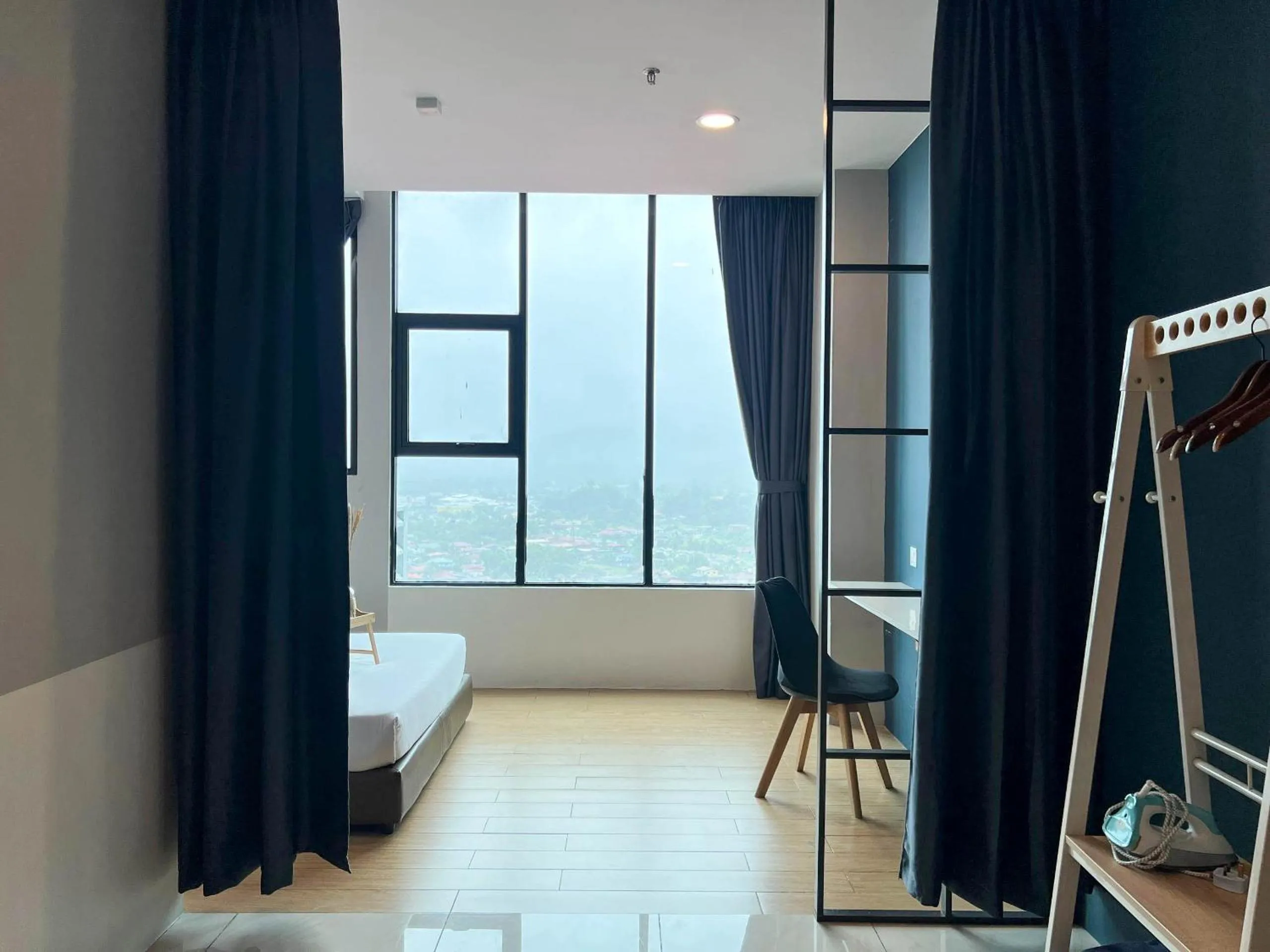 Bed in Hush Inn at ITCC Manhattan Suites