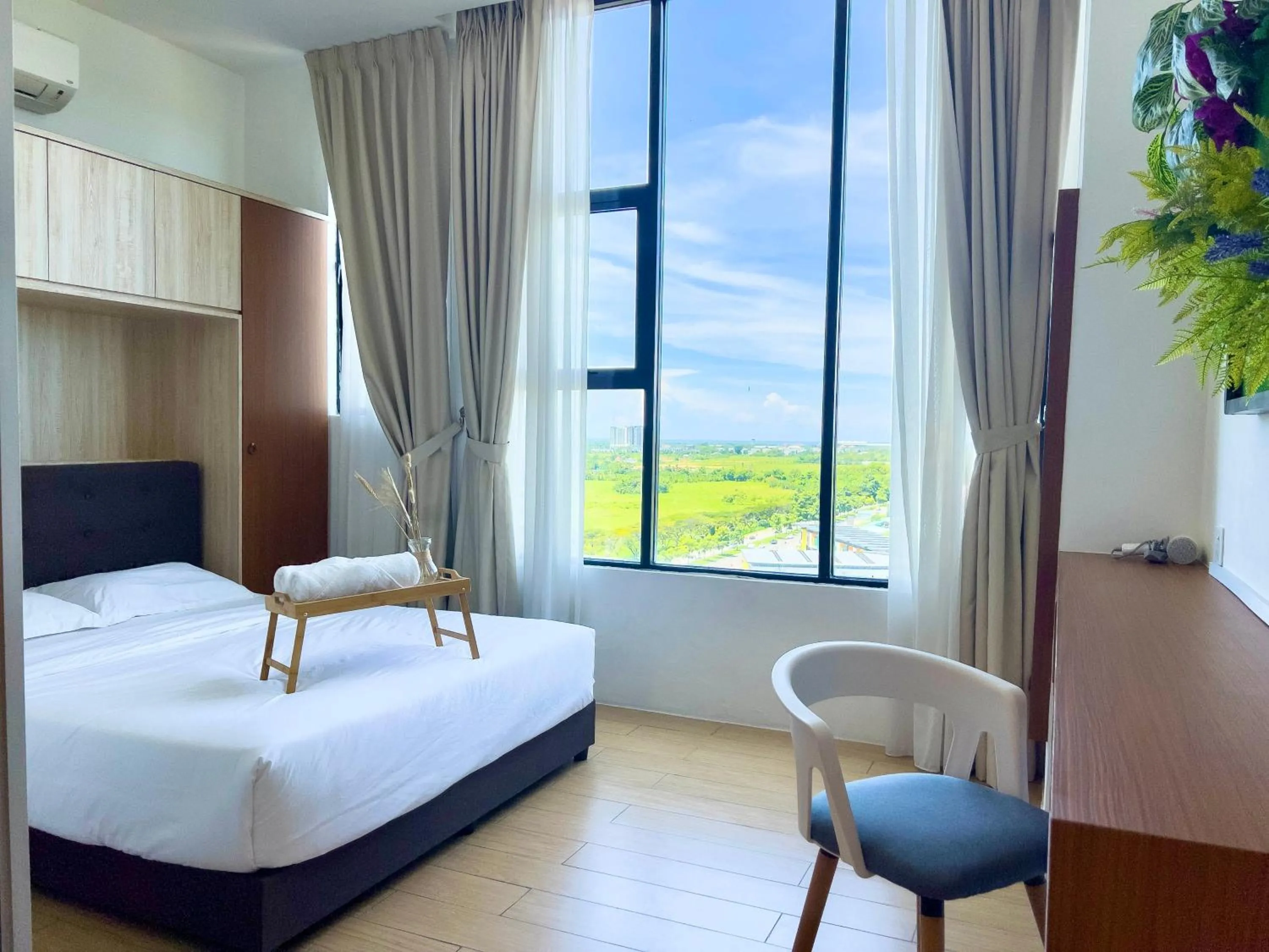 Bed in Hush Inn at ITCC Manhattan Suites