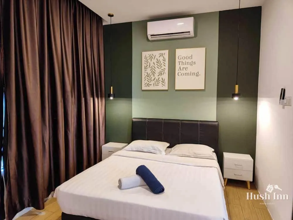 Bed in Hush Inn at ITCC Manhattan Suites