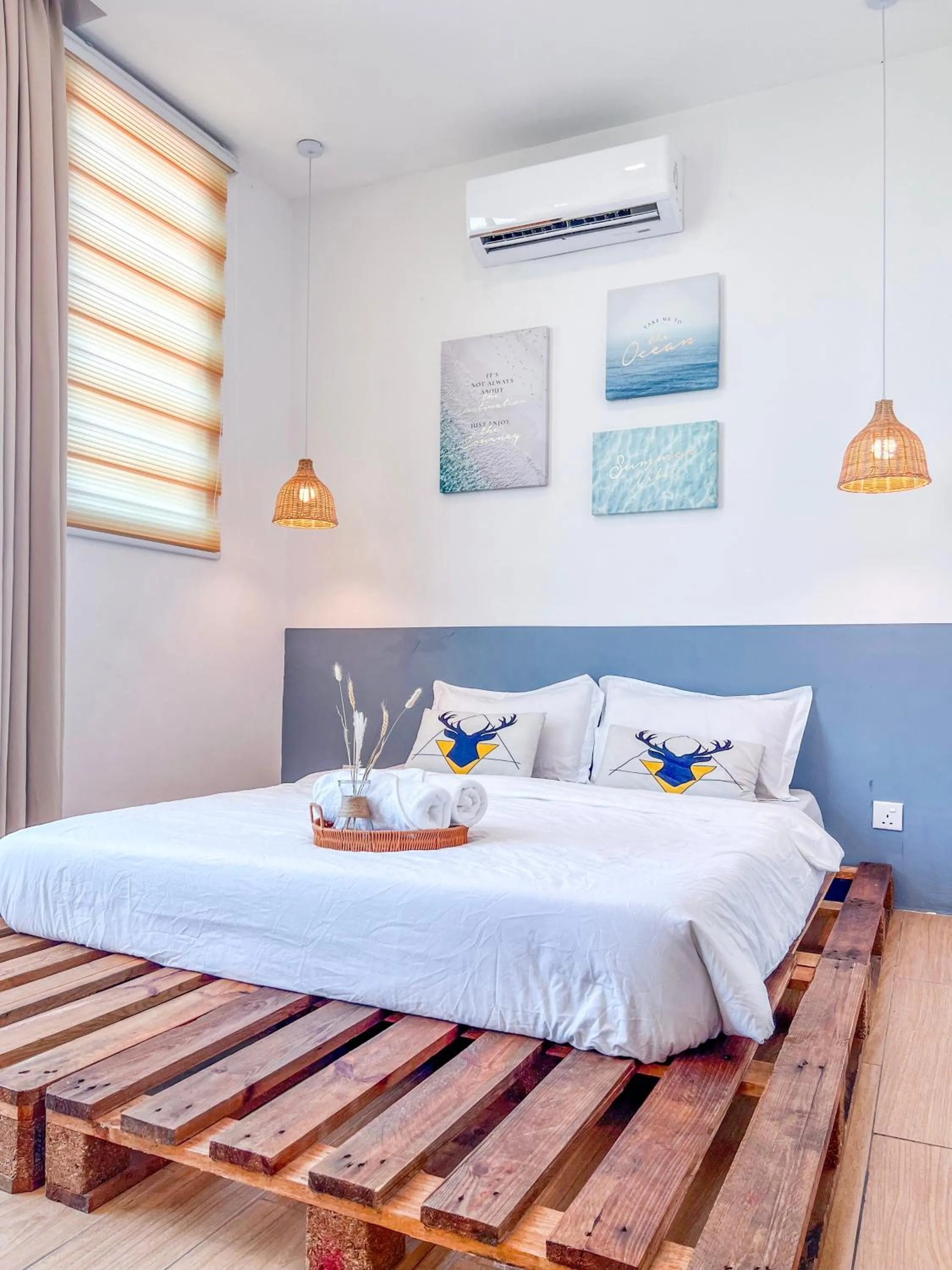 Bed in Hush Inn at ITCC Manhattan Suites