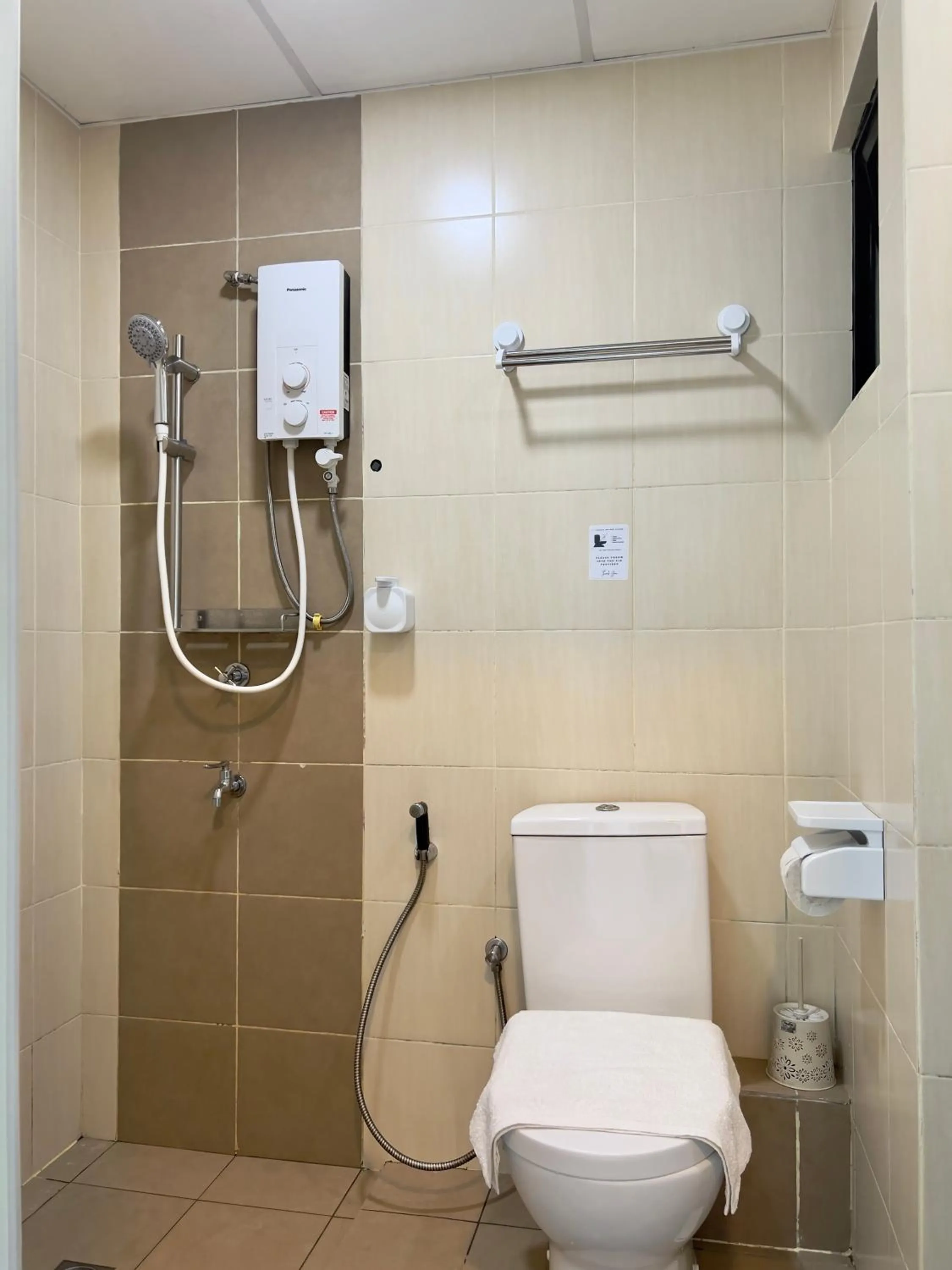Bathroom in Hush Inn at ITCC Manhattan Suites