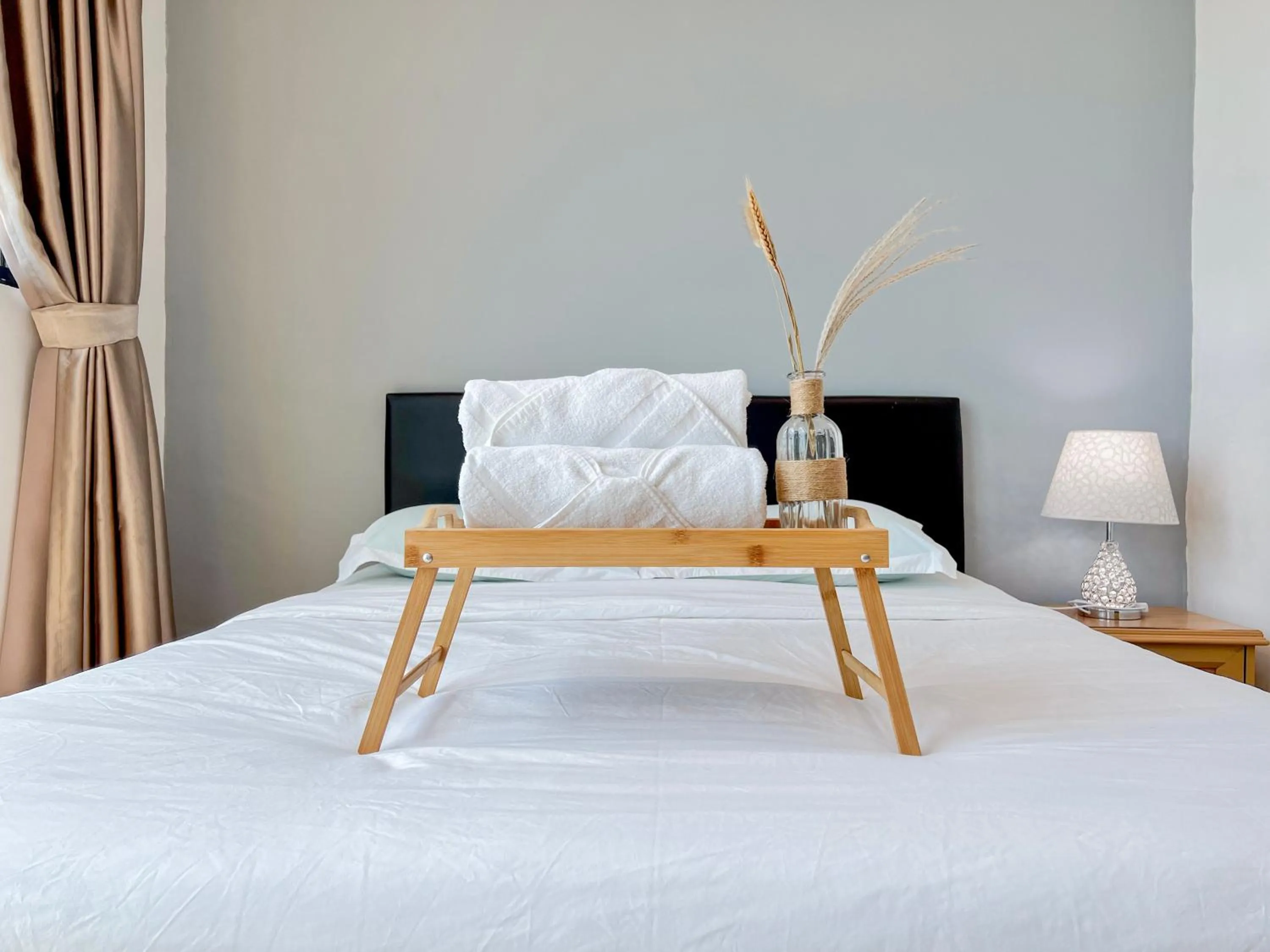 Bed in Hush Inn at ITCC Manhattan Suites