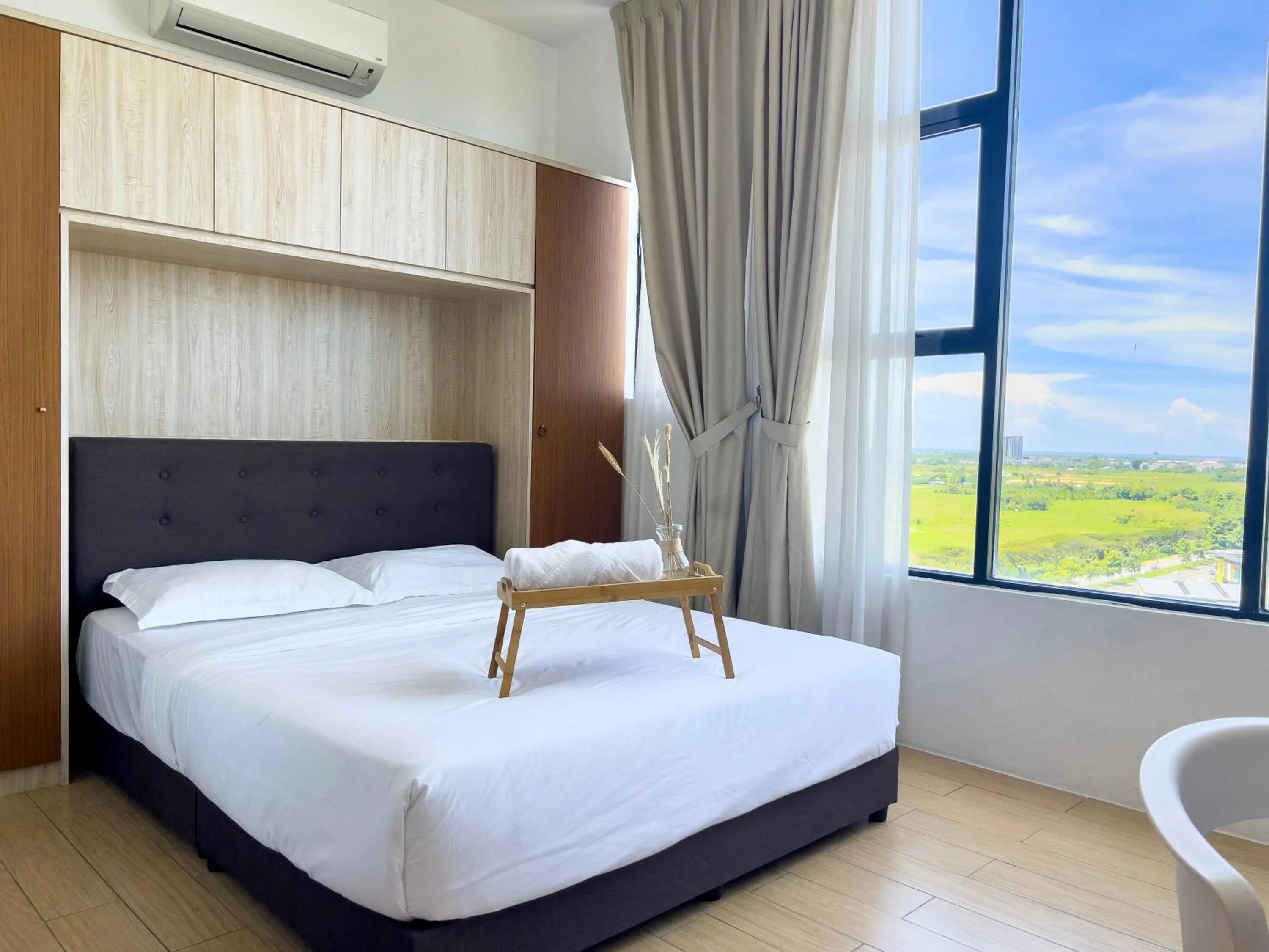 Bed in Hush Inn at ITCC Manhattan Suites