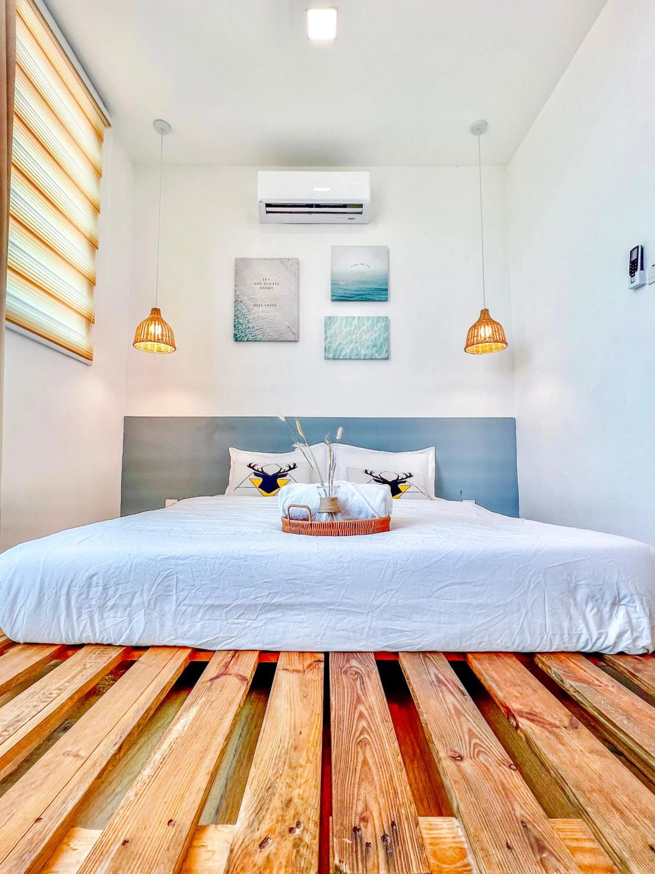 Bed in Hush Inn at ITCC Manhattan Suites