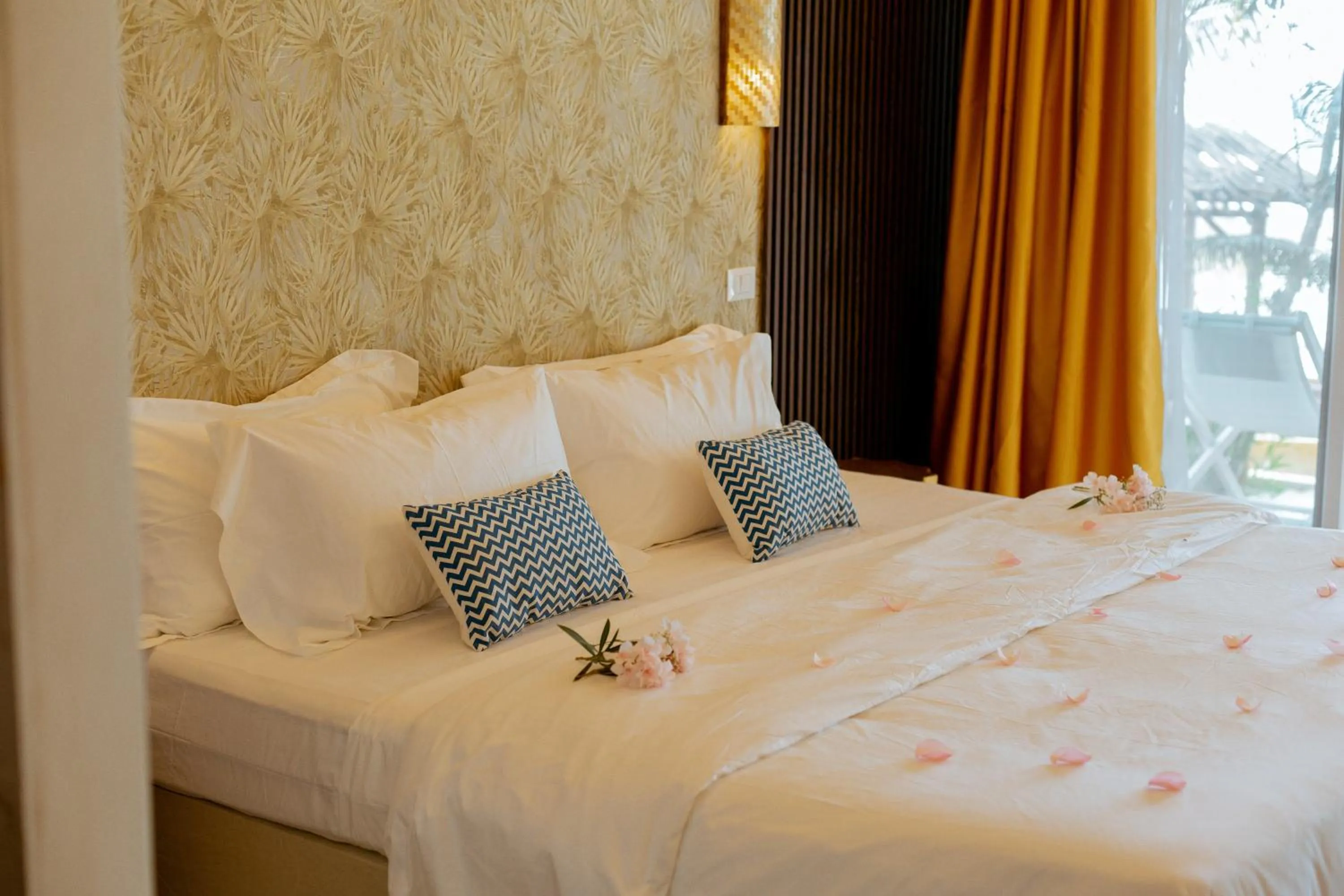 Bed in Coral Rocks Hotel & Restaurant